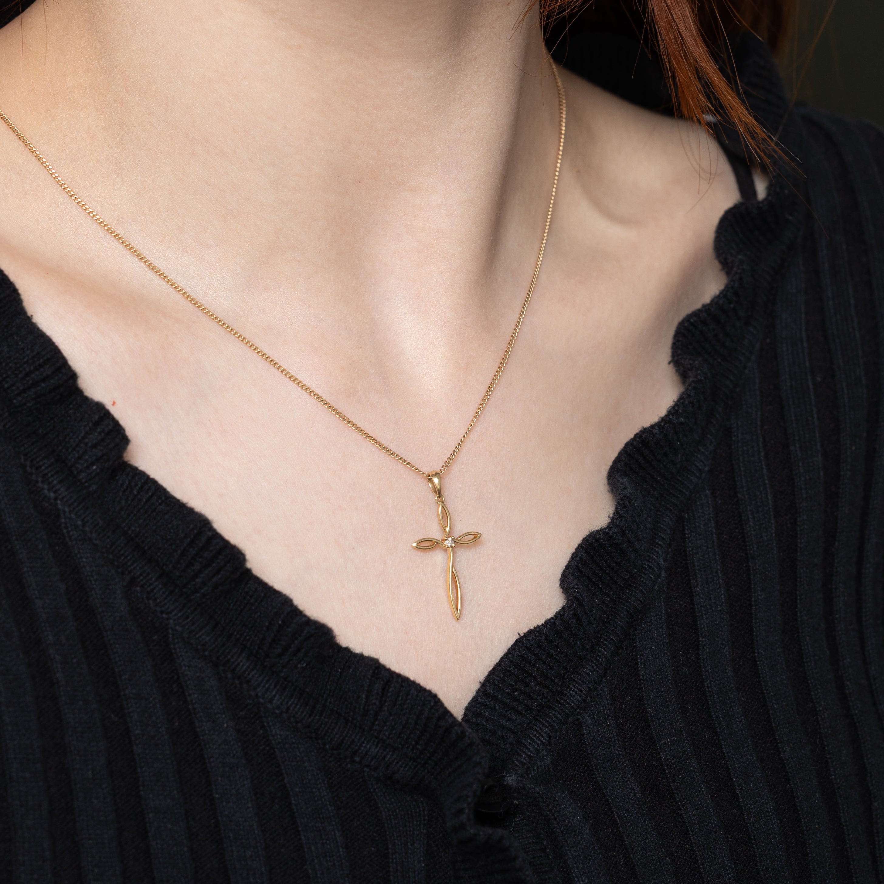 10k Yellow Gold Diamond Twisted Cross Pendant