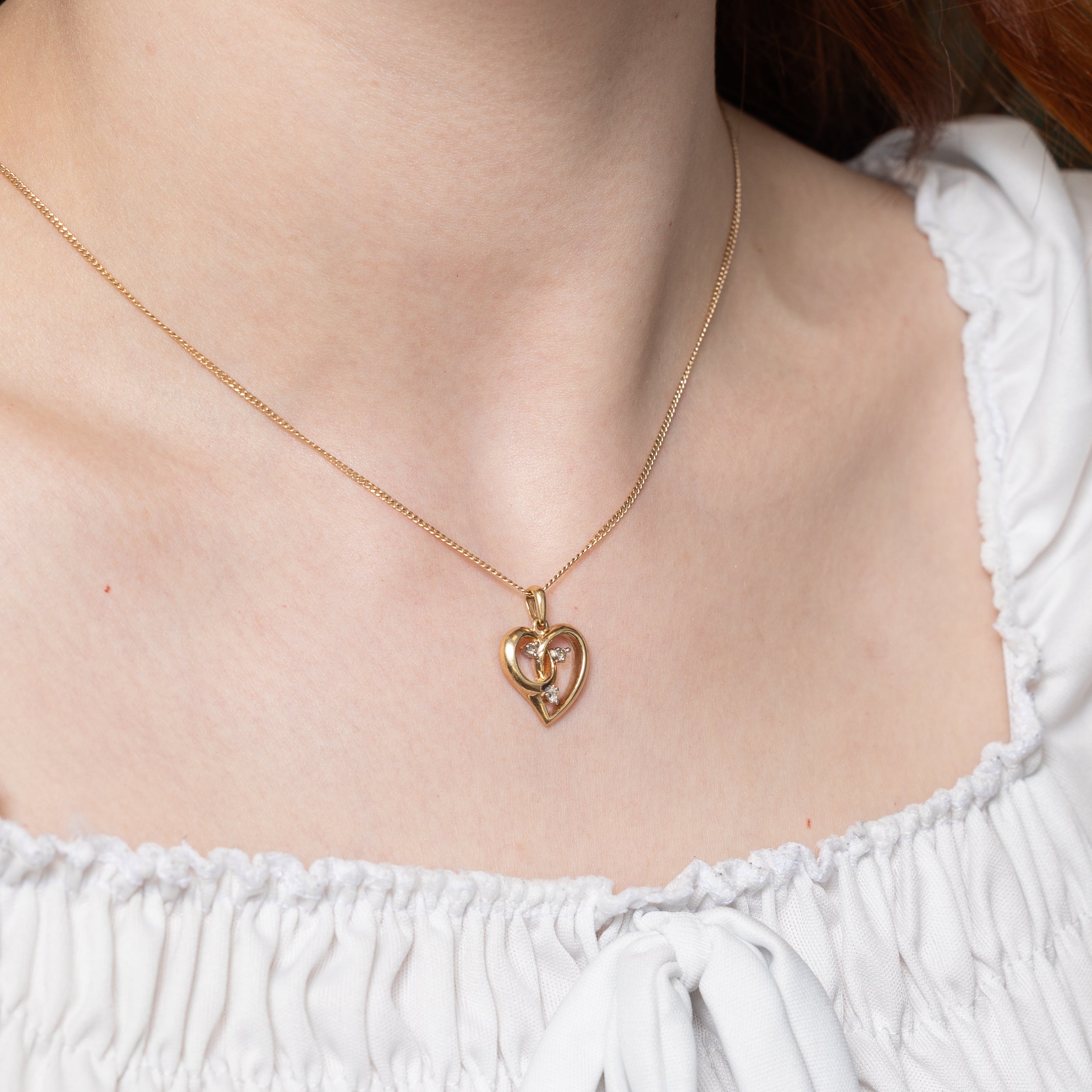 10k Diamond Swirl Heart Charm