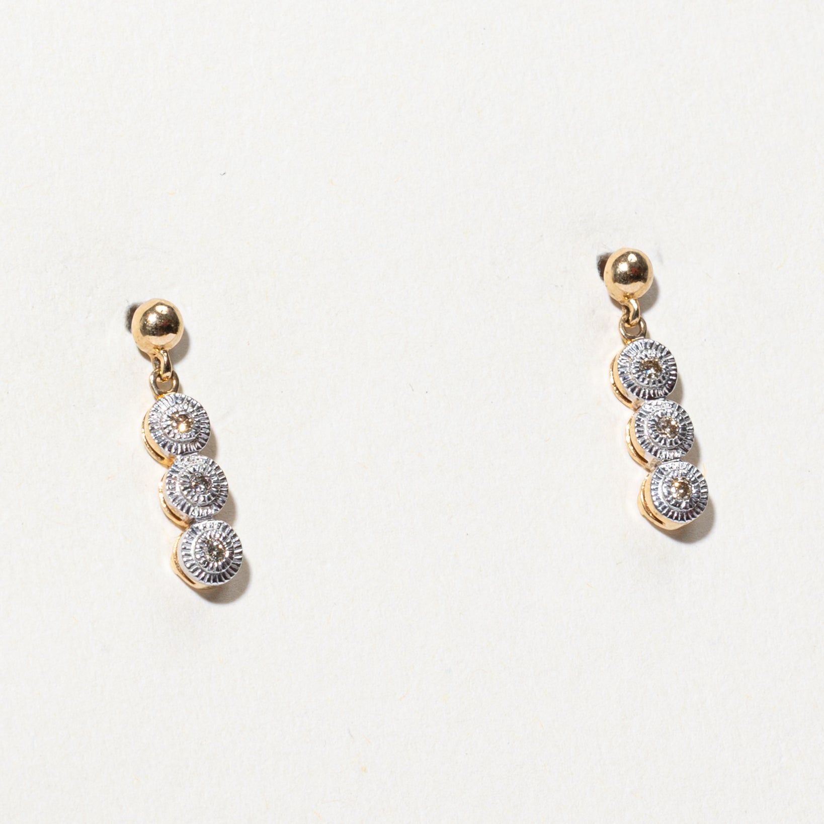 10k Three Stone Illusion Set Diamond Drop Earrings