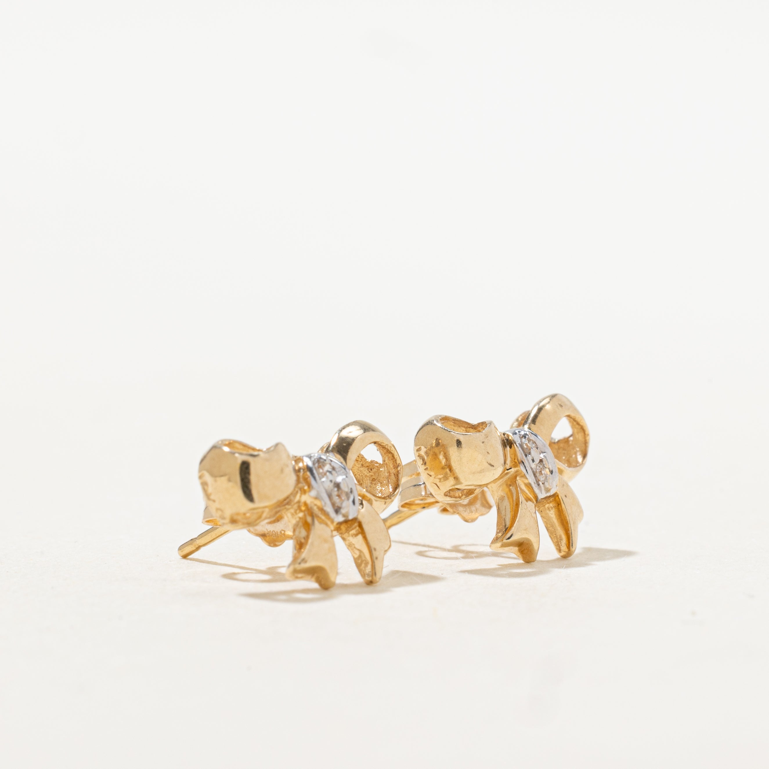 10k Diamond Bow Stud Earrings