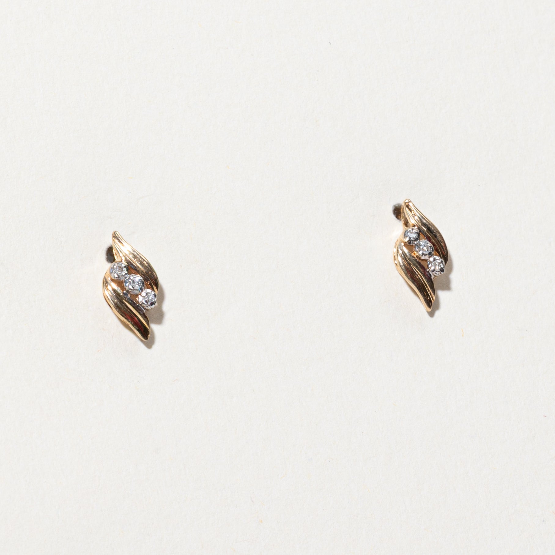 10k Diamond Grooved Swirl Stud Earrings