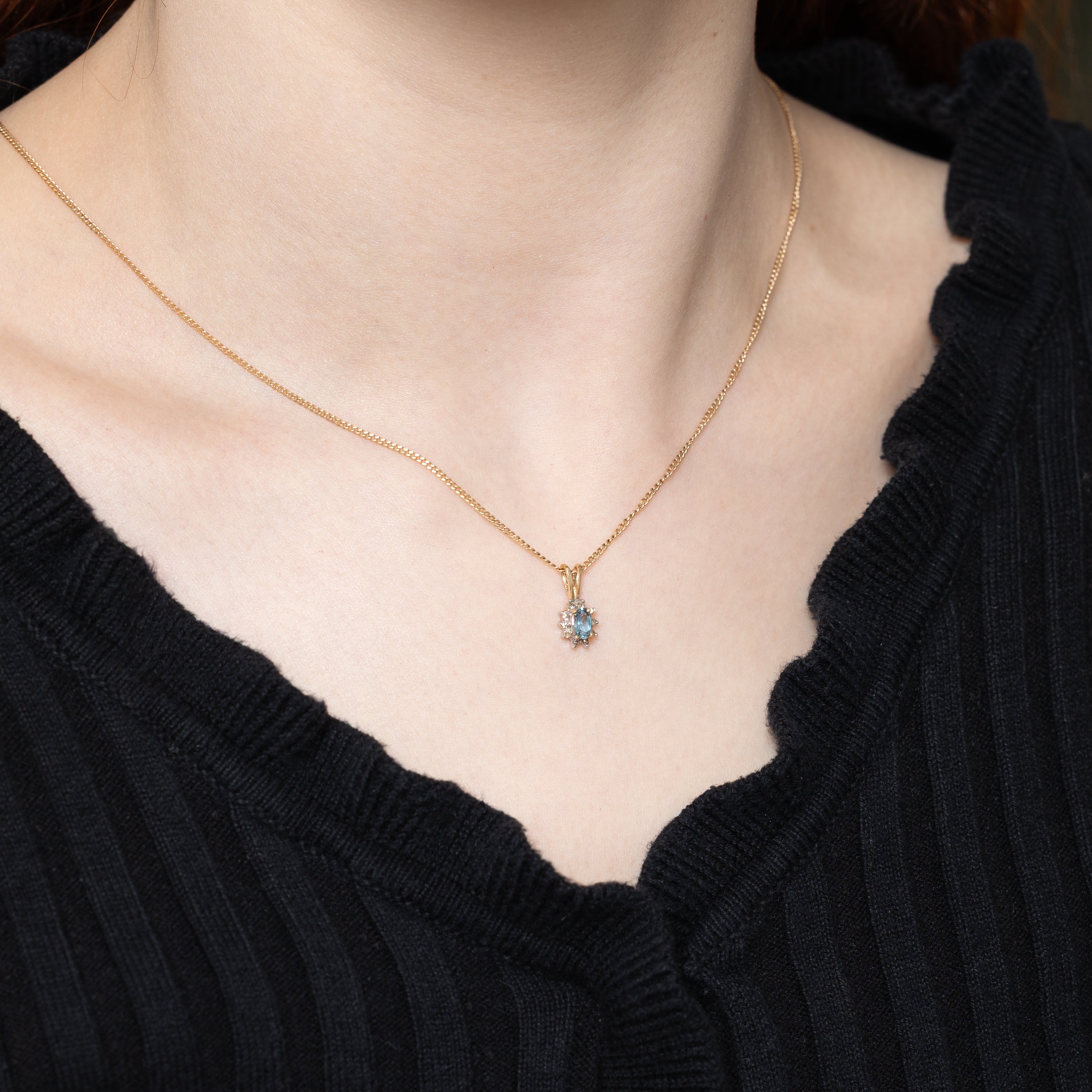 10k Blue Topaz & Diamond Halo Pendant