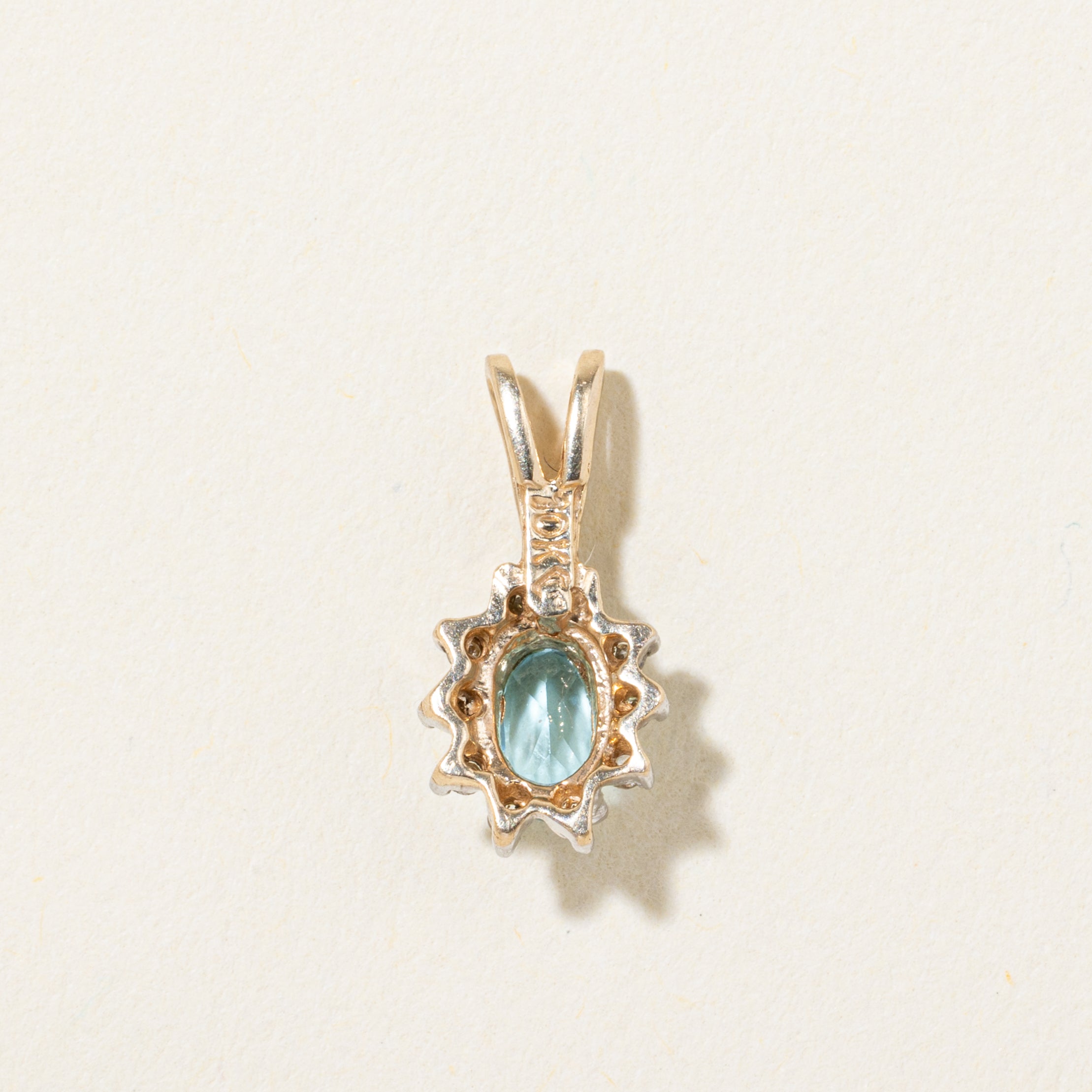 10k Blue Topaz & Diamond Halo Pendant
