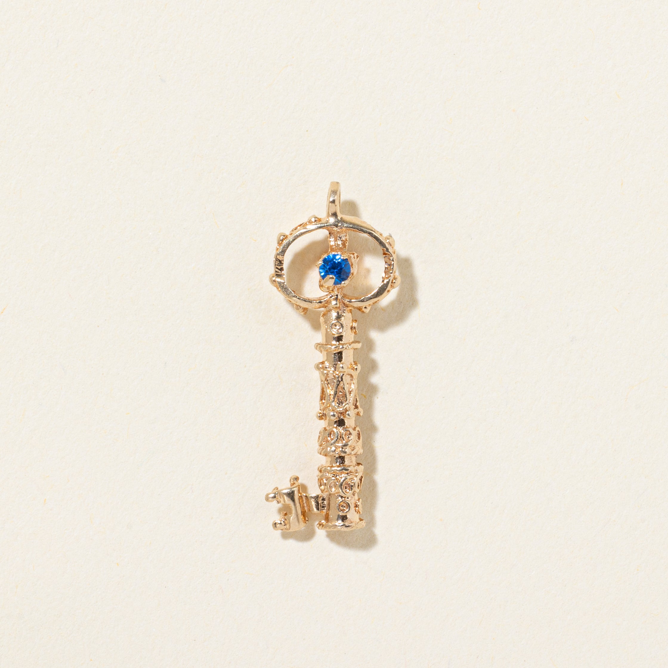 14k Synthetic Spinel Textured Key Pendant | 0.036ctw