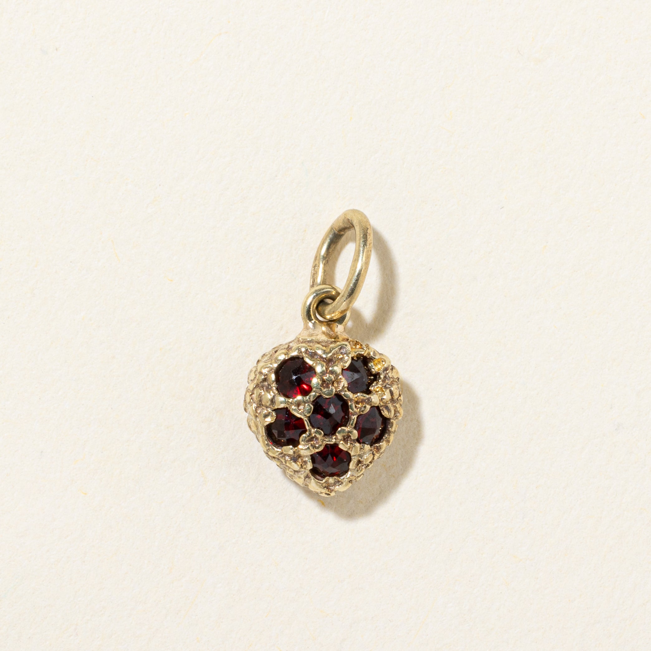 14k Garnet Textured Heart Pendant | 0.23ctw