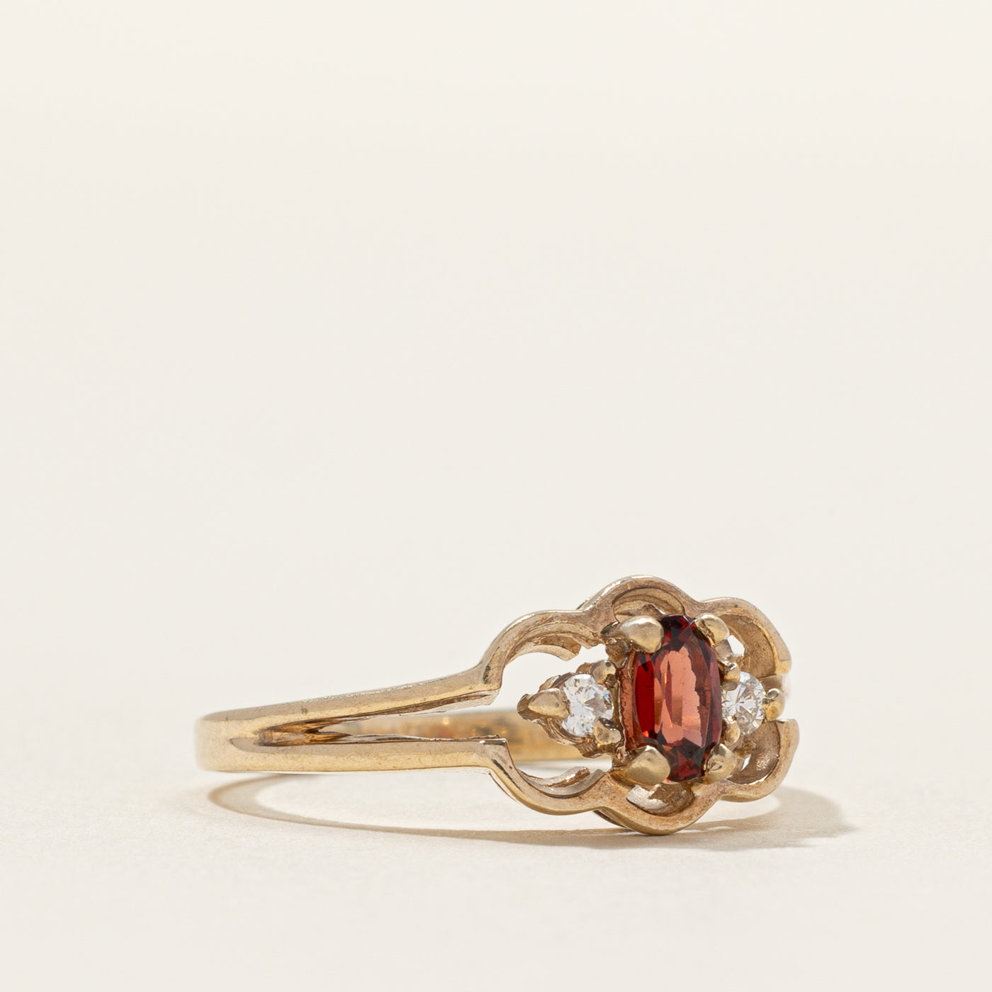 Oval Cut Garnet & Diamond Framed Ring | 0.03ctw | SZ 4.75