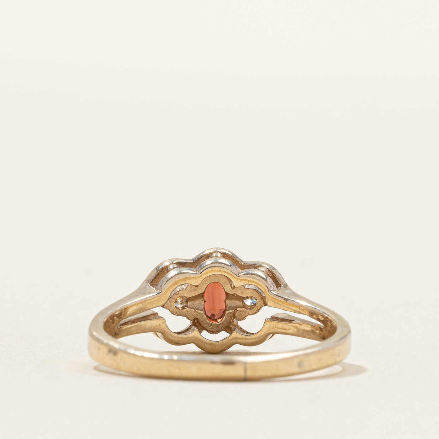 Oval Cut Garnet & Diamond Framed Ring | 0.03ctw | SZ 4.75