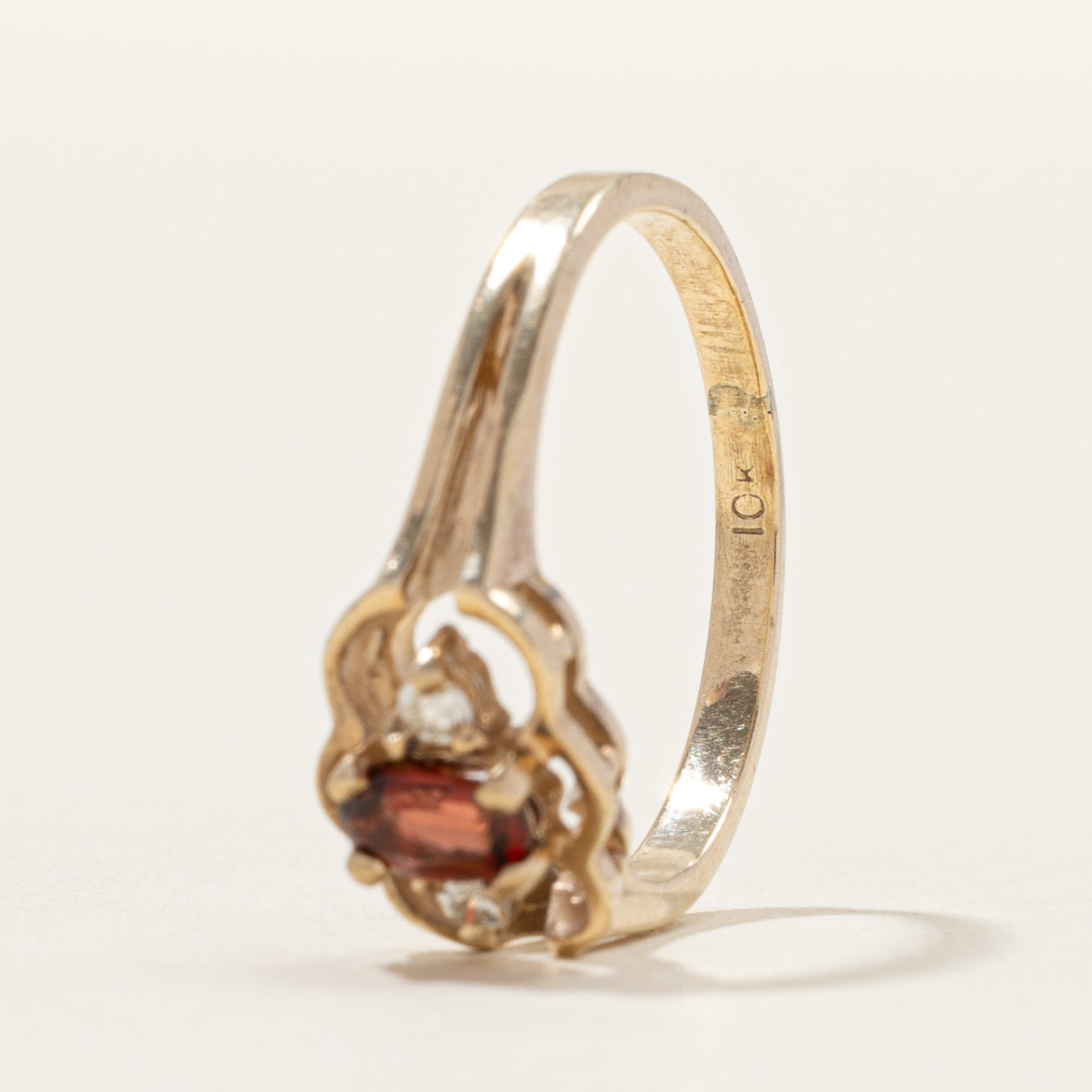 Oval Cut Garnet & Diamond Framed Ring | 0.03ctw | SZ 4.75