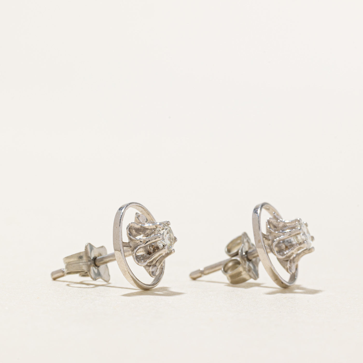 14k Illusion Set Diamond Circle Framed Stud Earrings | 0.20ctw