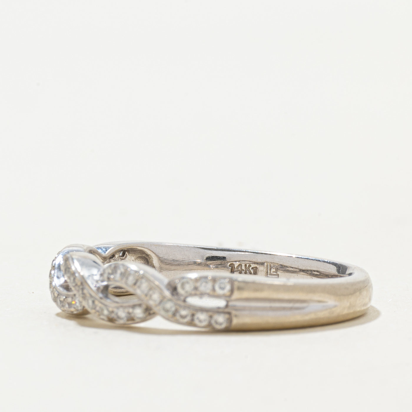 14k Diamond Infinity Twist Band | SZ 8.5