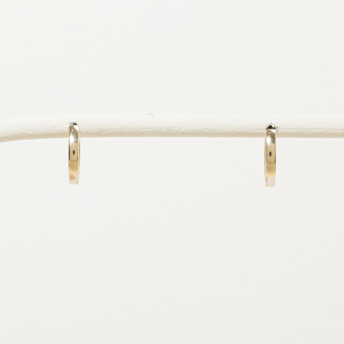 '100 Ways' 10k Plain Huggie Earrings