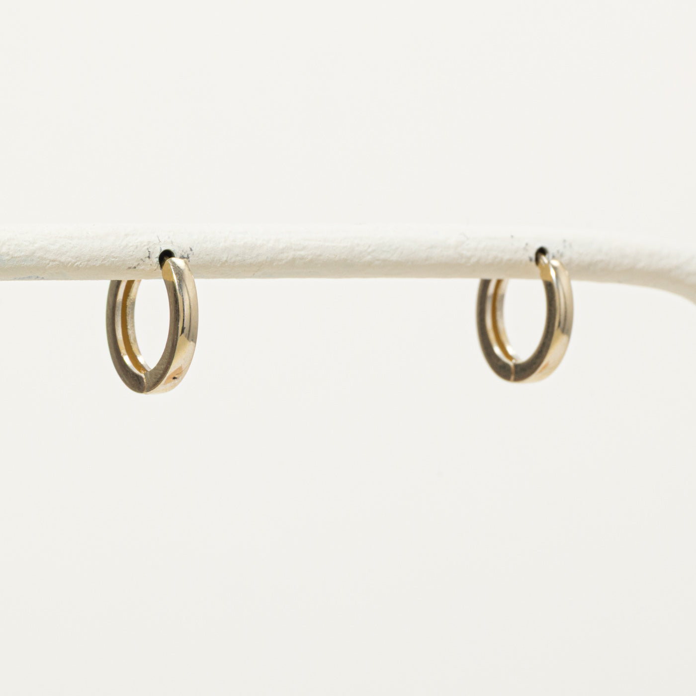 '100 Ways' 10k Plain Huggie Earrings