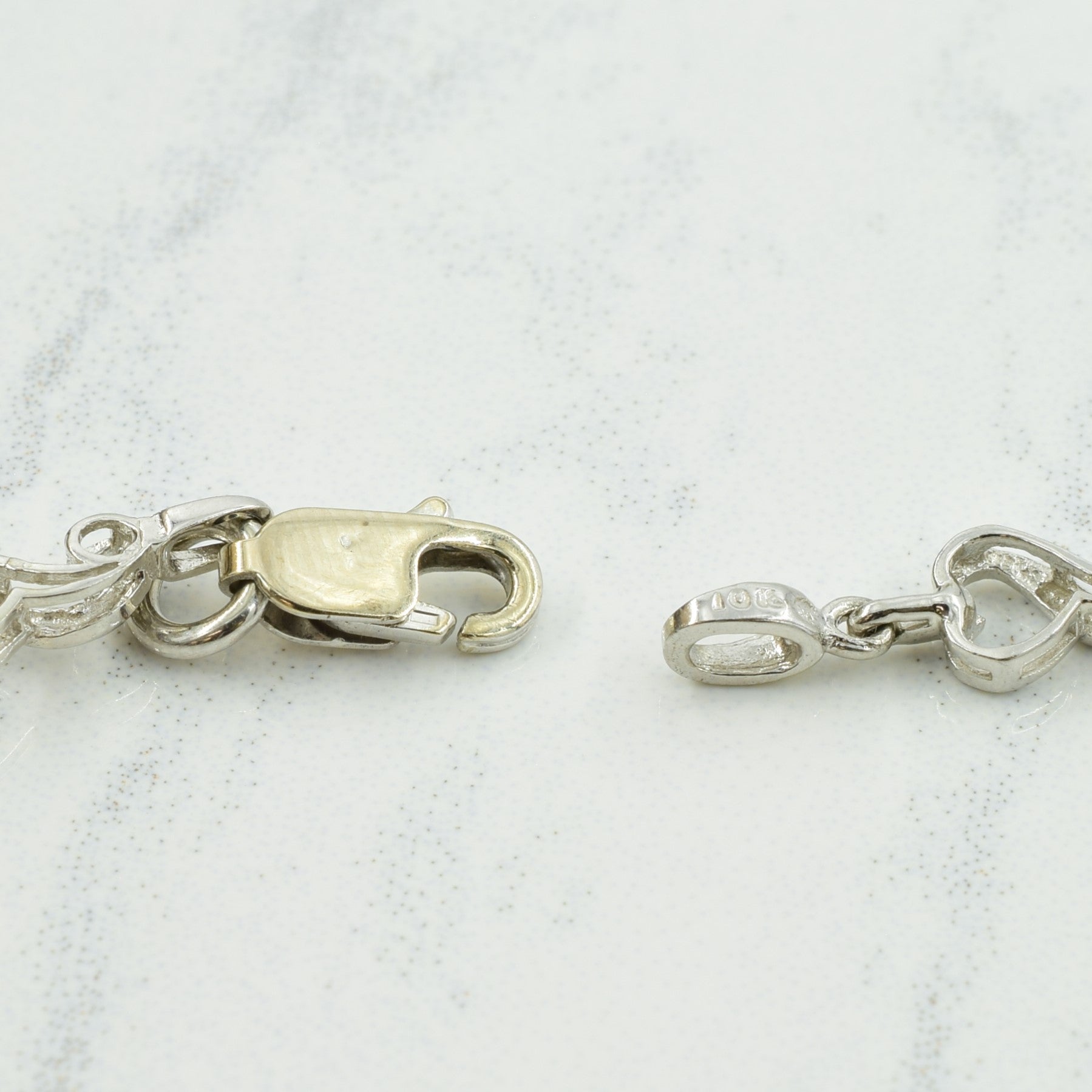 10k White Gold Diamond Heart Bracelet | 0.03ctw | 7.50