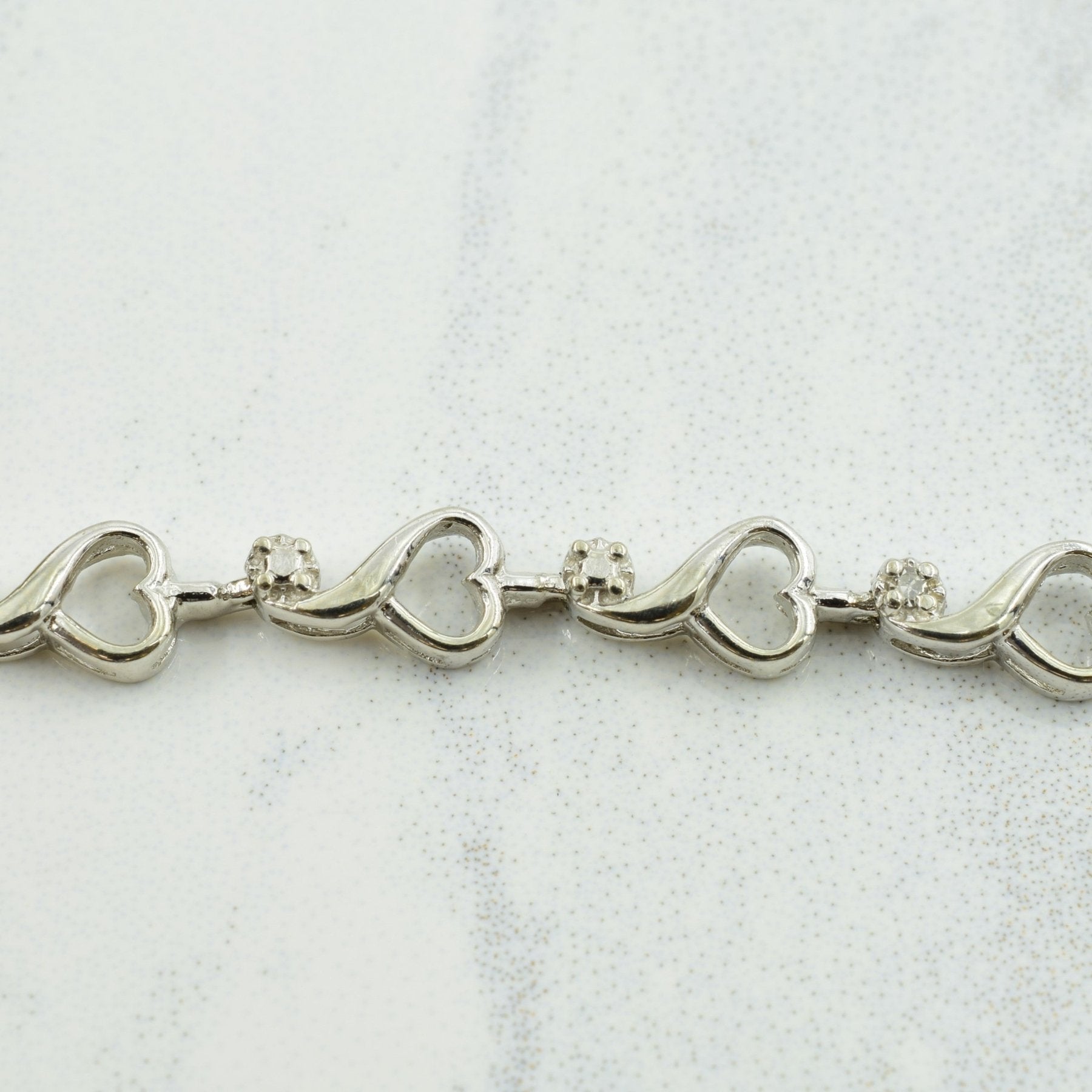 10k White Gold Diamond Heart Bracelet | 0.03ctw | 7.50