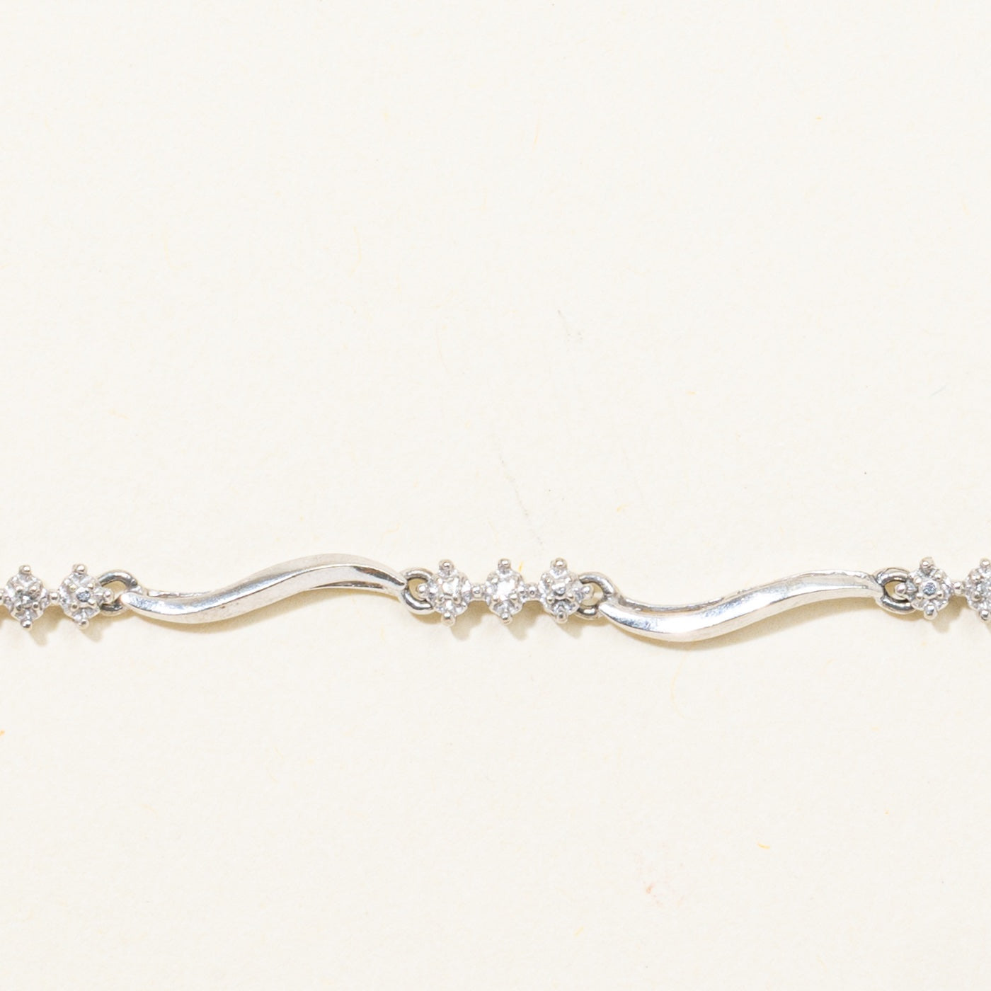 10k Scattered Diamond Wave Bracelet | 7.25"