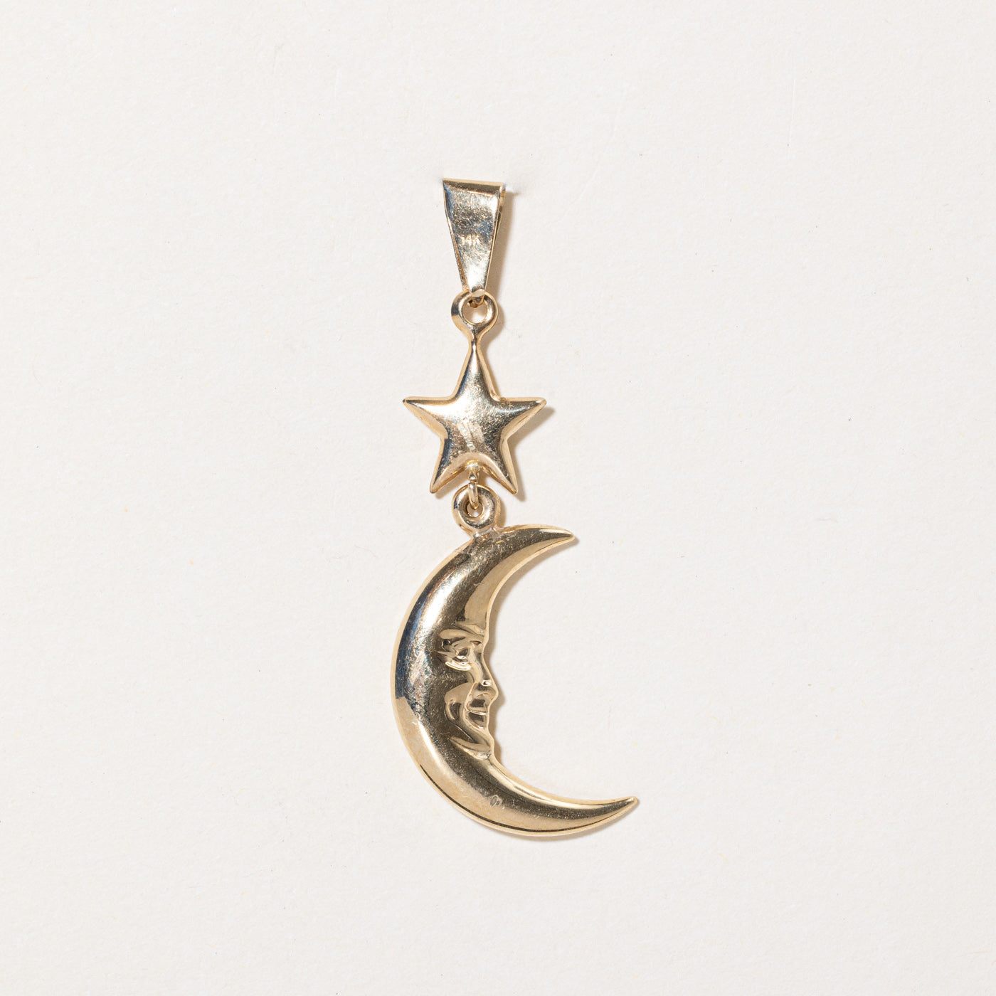 Pendentif lune et étoile en or jaune 14 carats