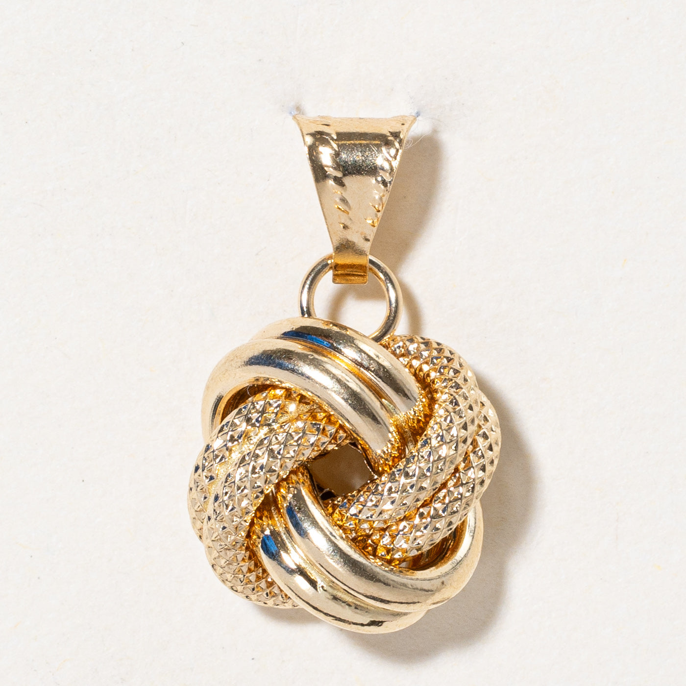 Breloque nœud en or jaune 18 carats 