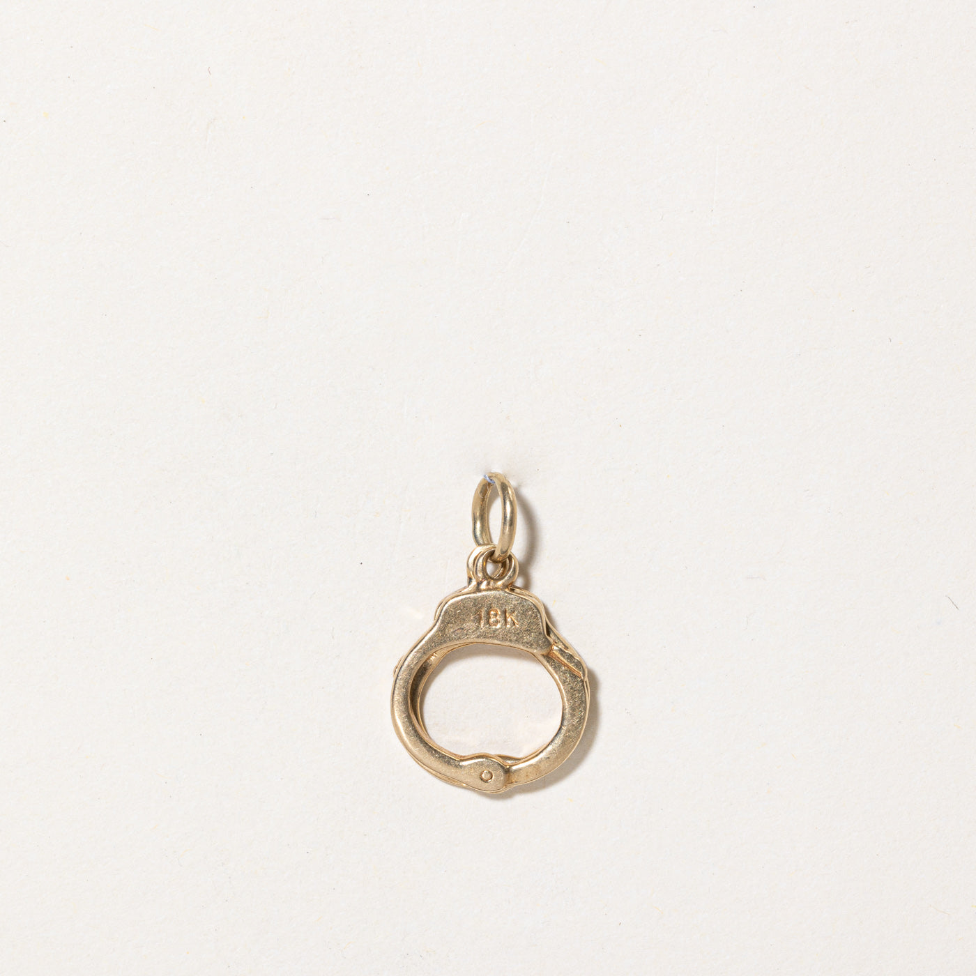 Breloque menottes en or jaune 18 carats 