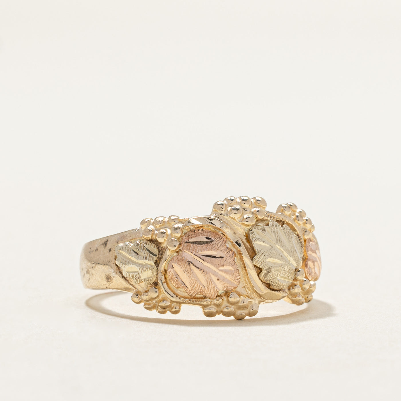Bague bicolore en or 10 carats à motif de feuilles | Taille 8,5