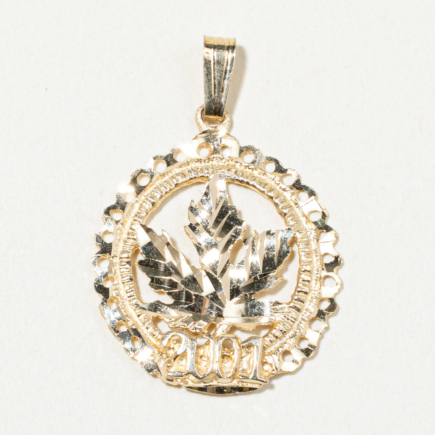 10k Yellow Gold "2001" Maple Leaf Pendant