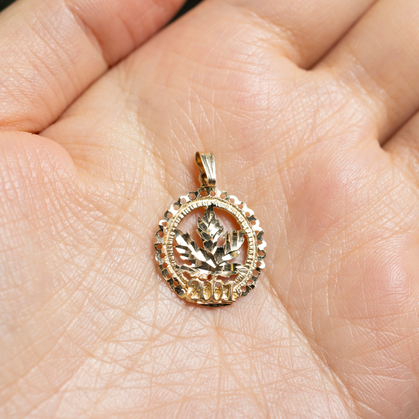 10k Yellow Gold "2001" Maple Leaf Pendant