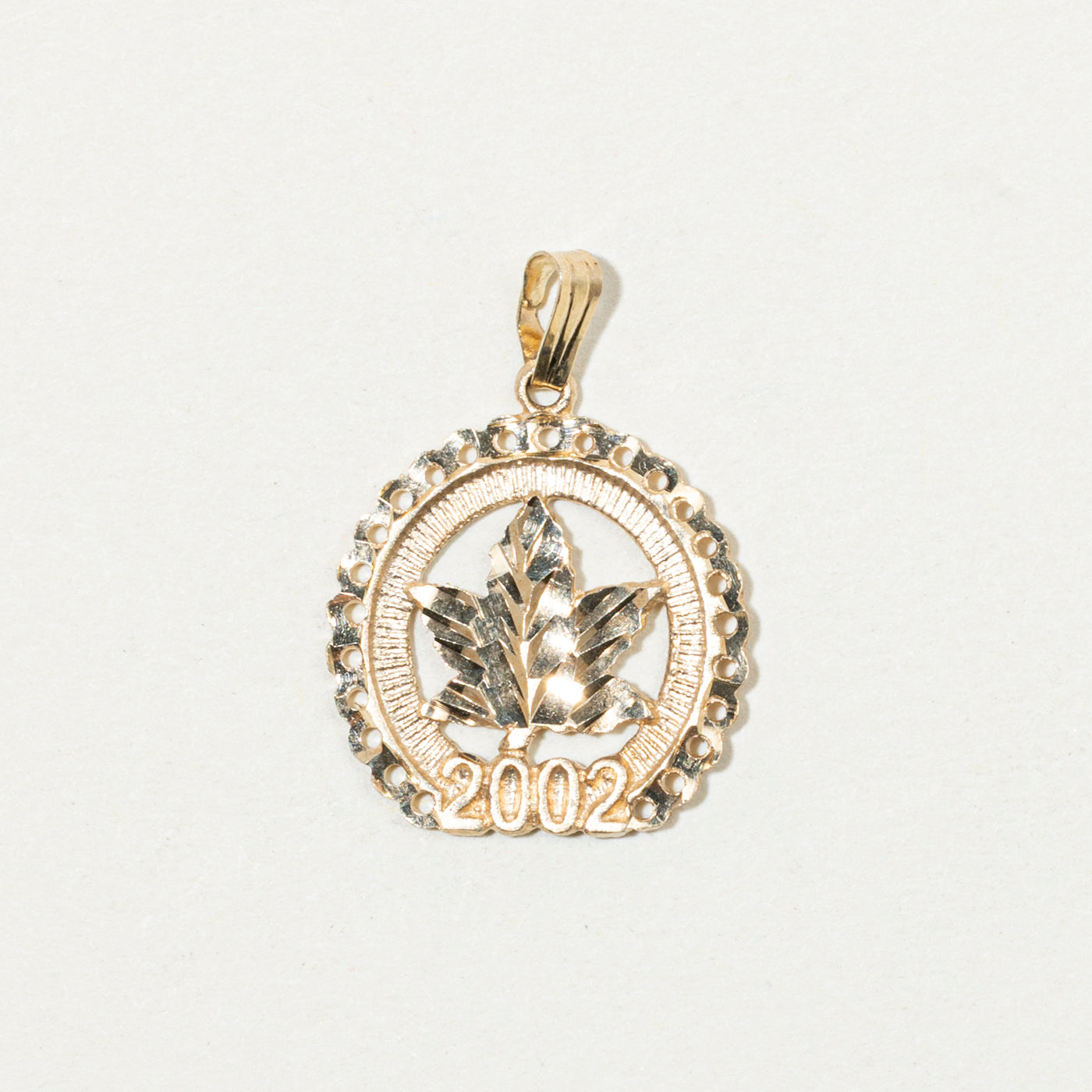 10k Yellow Gold Year 2002 Maple Leaf Charm