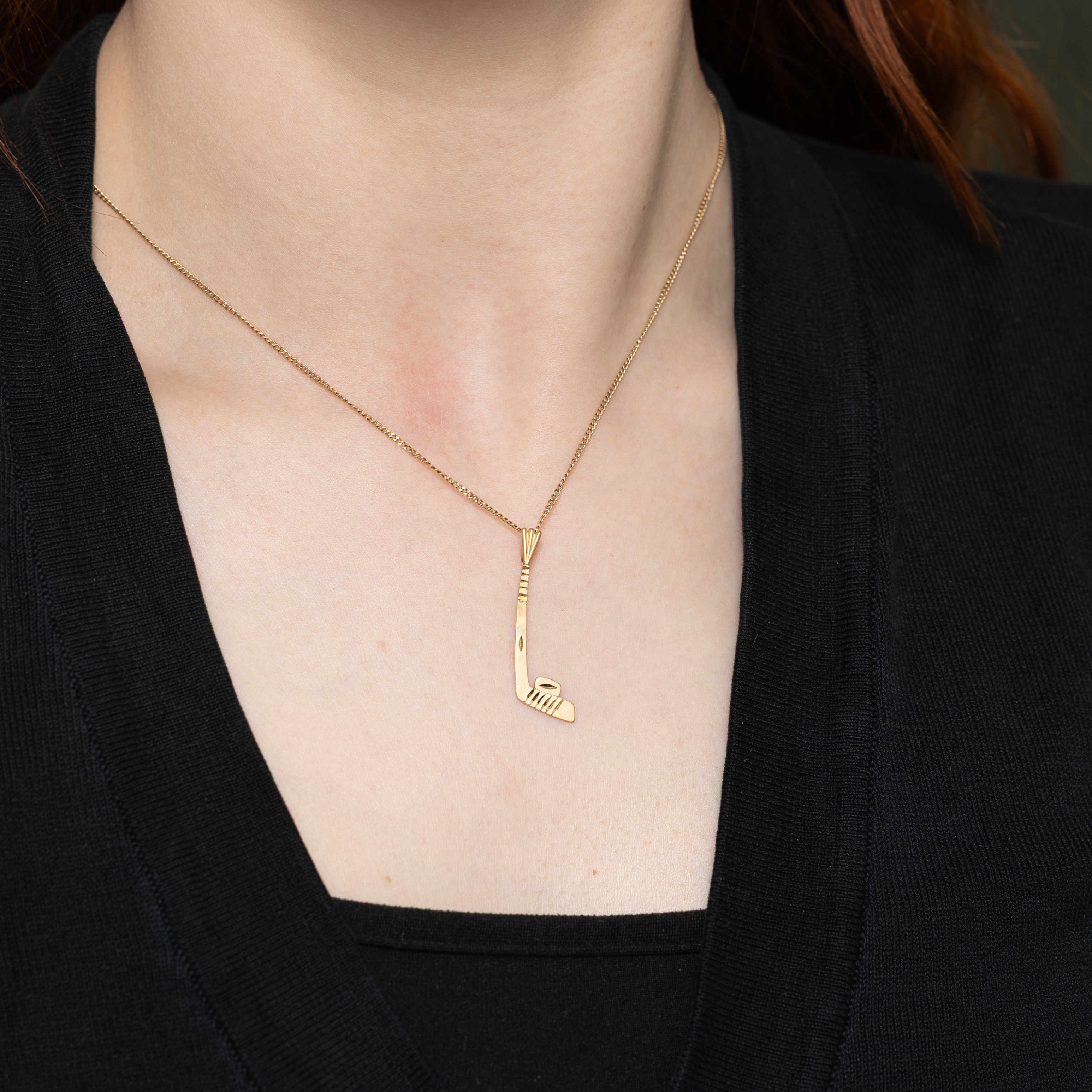 14k Yellow Gold Hockey Stick & Puck Pendant