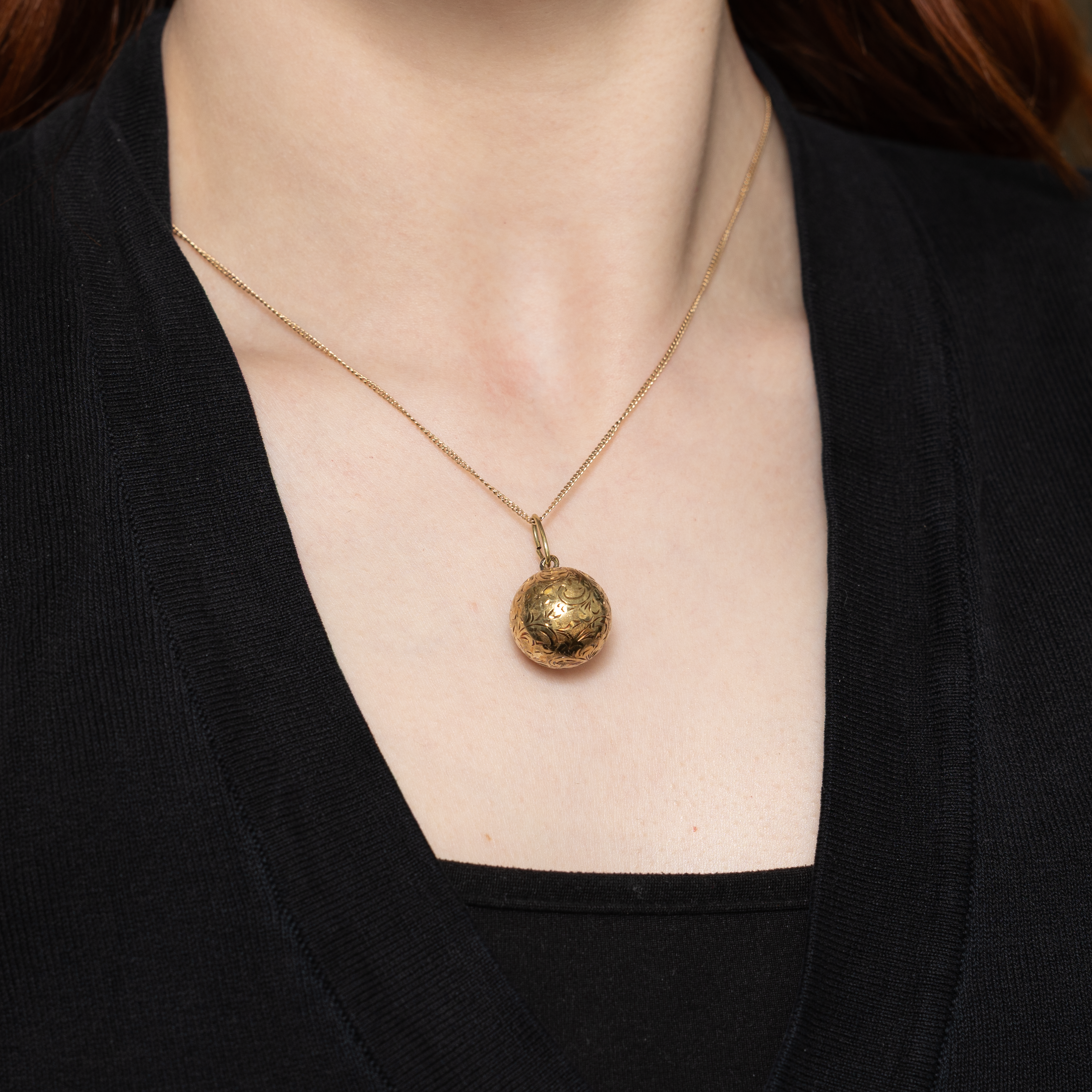 Breloque boule en or jaune 14 carats