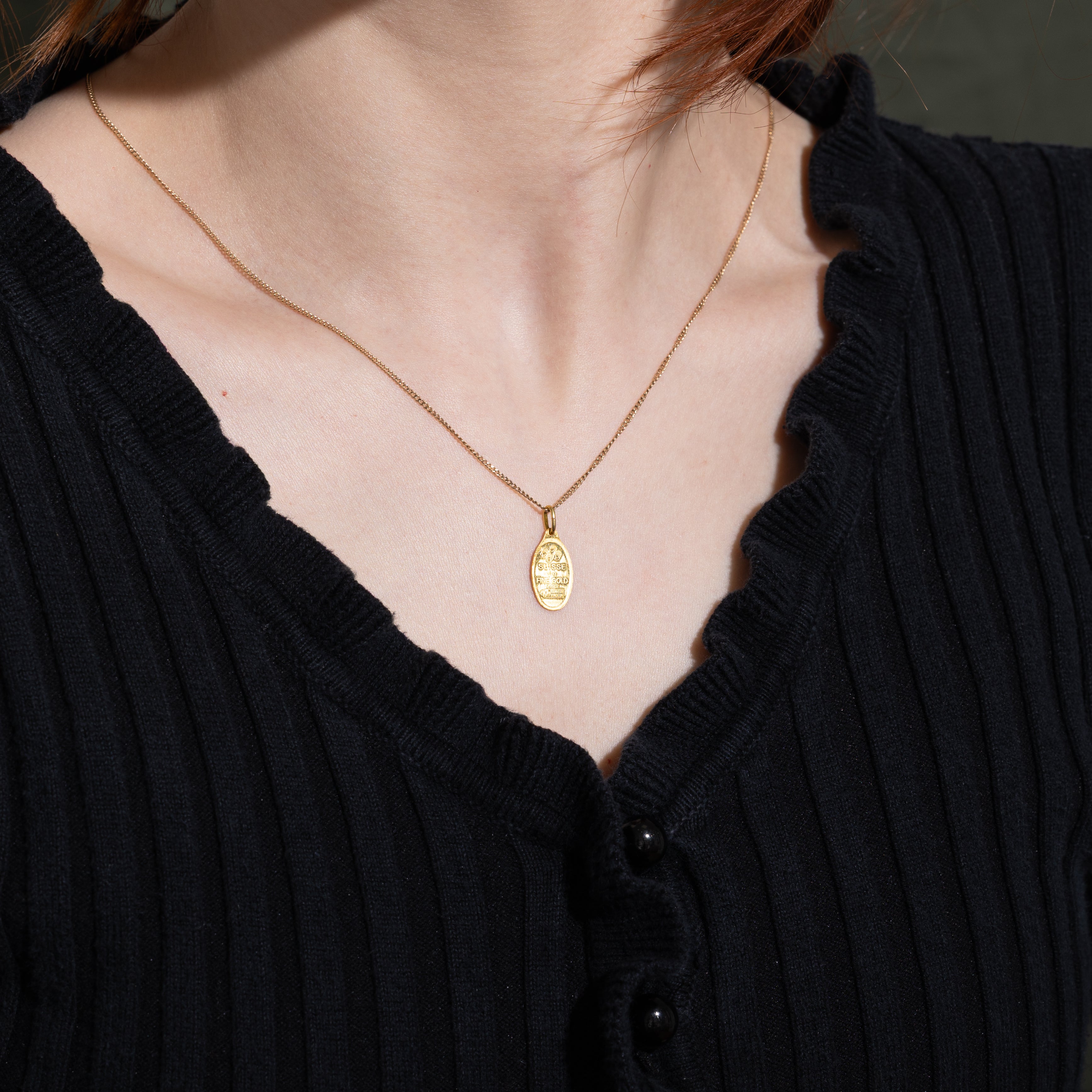 Breloque suisse en or jaune 24 carats (1 gramme)