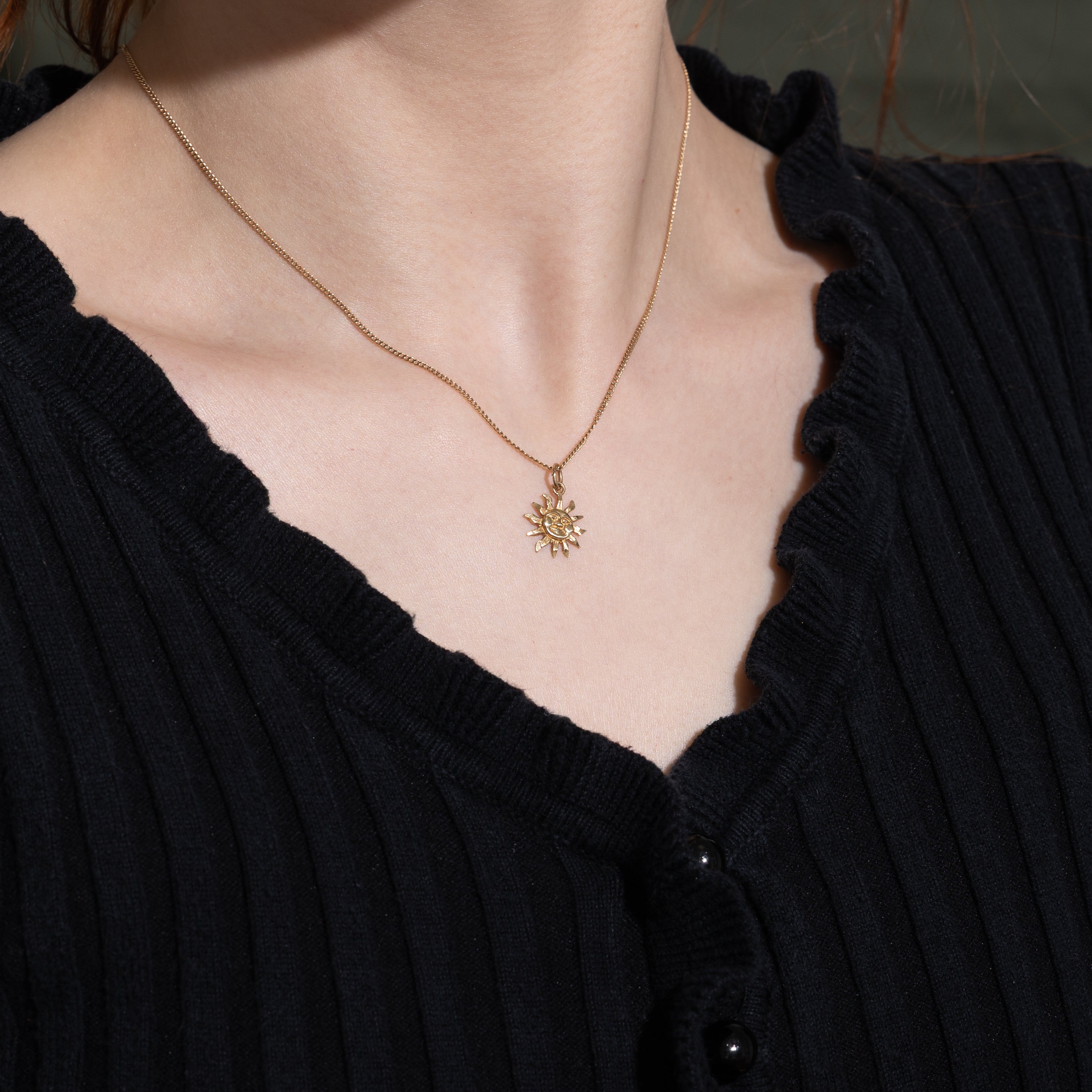 Breloque soleil en or jaune 10 carats