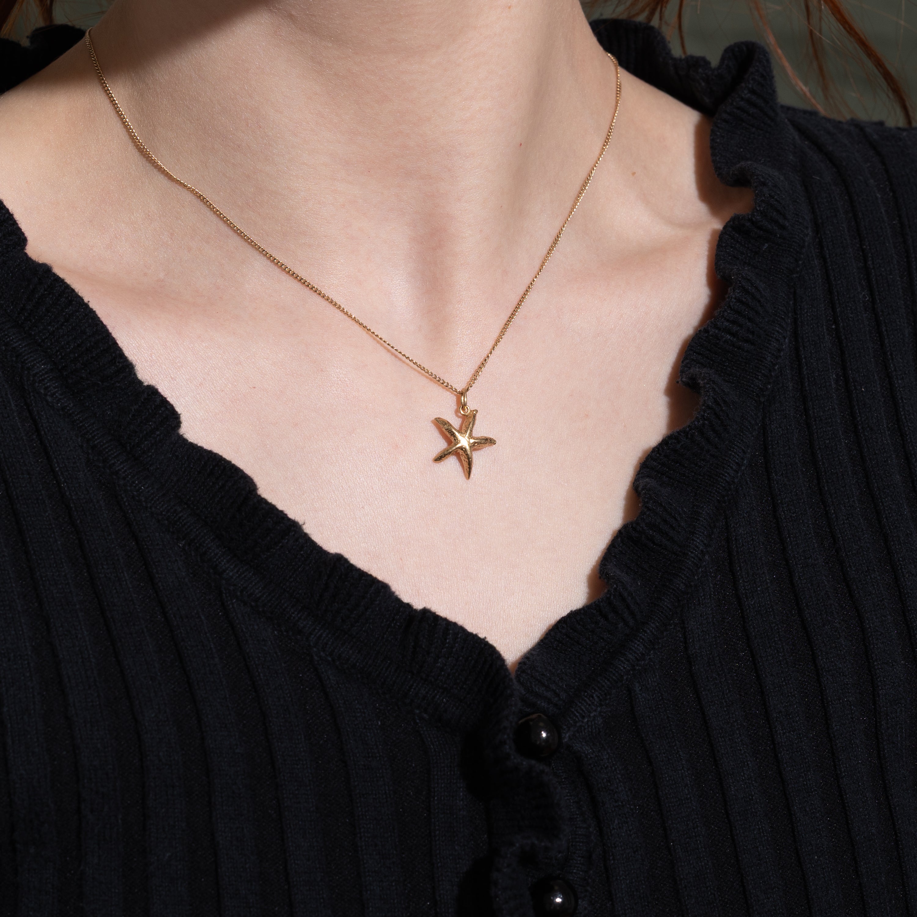 Breloque étoile de mer en or jaune 10 carats