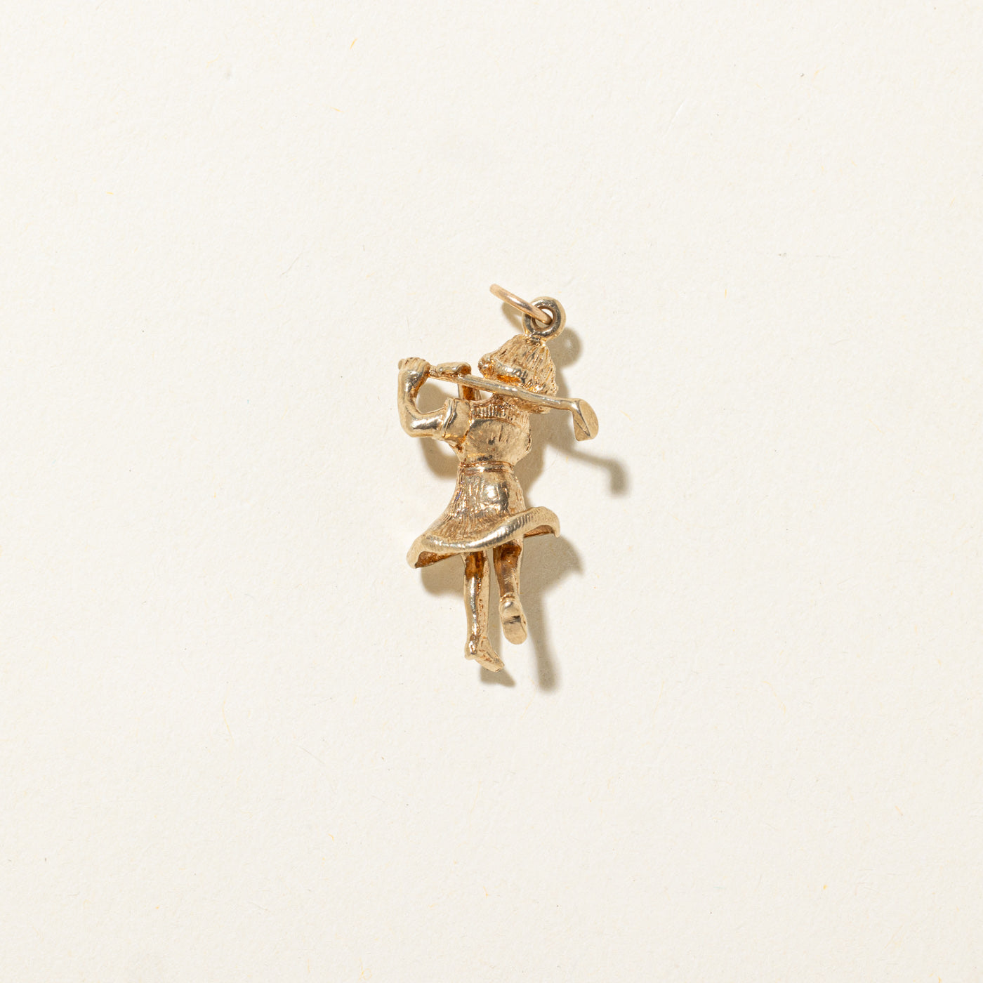 Charme de golfeuse de 10 000 $