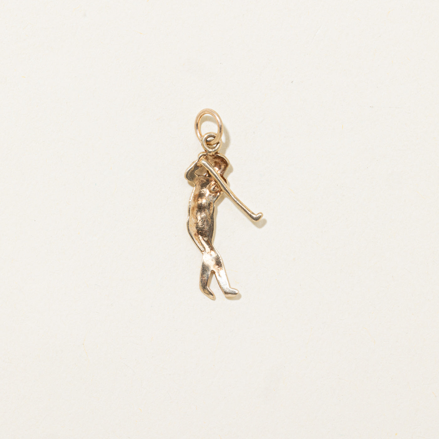 Breloque golfeur en or jaune 10 carats
