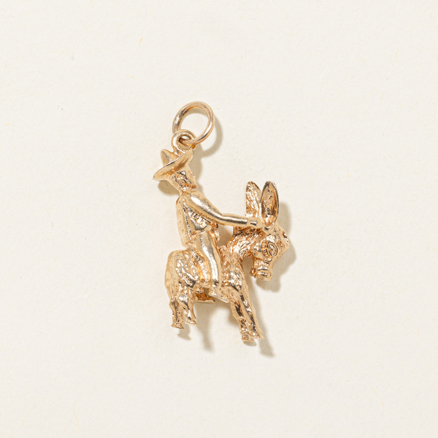Breloque Conquistador sur âne en or 14 carats