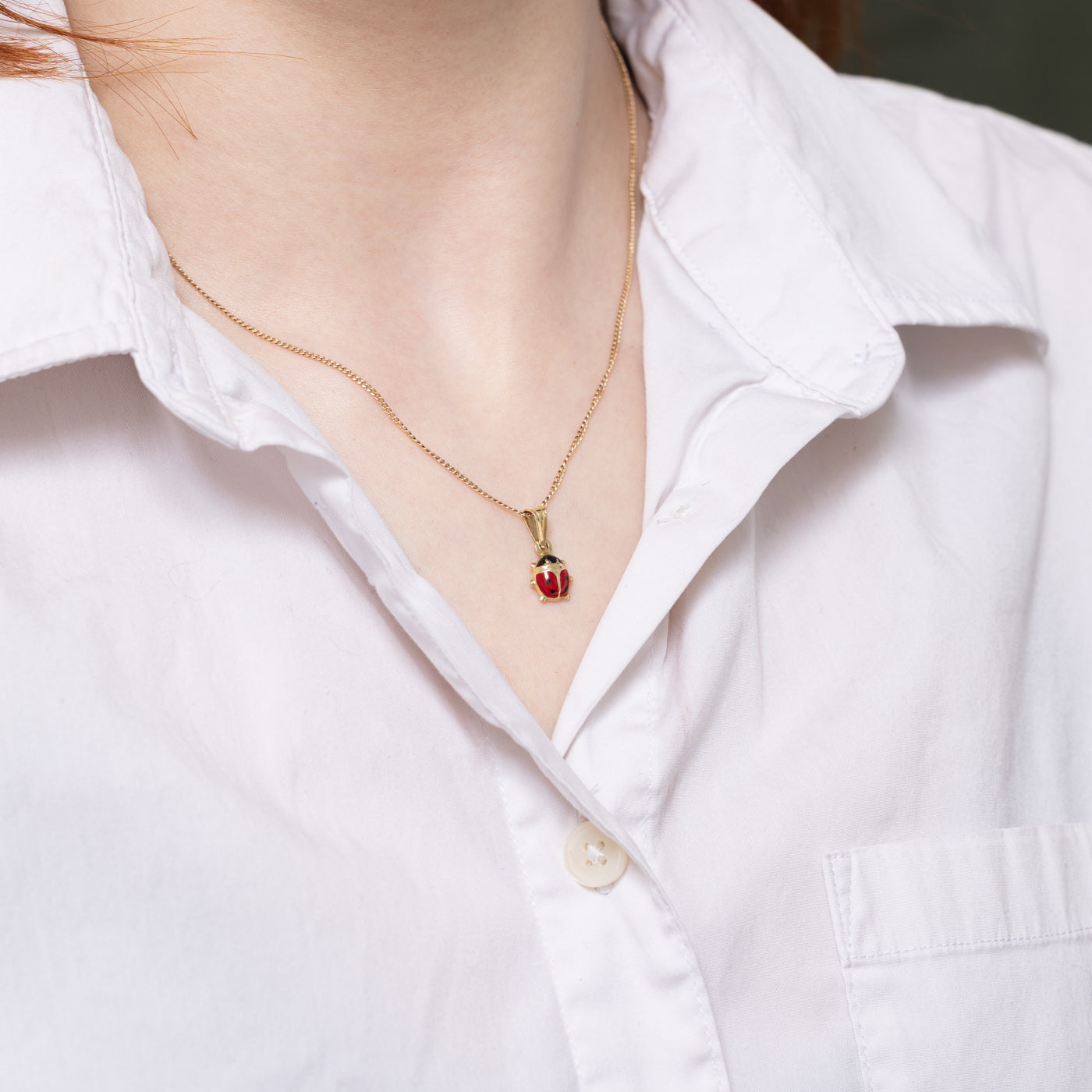 Pendentif coccinelle en or 14 carats