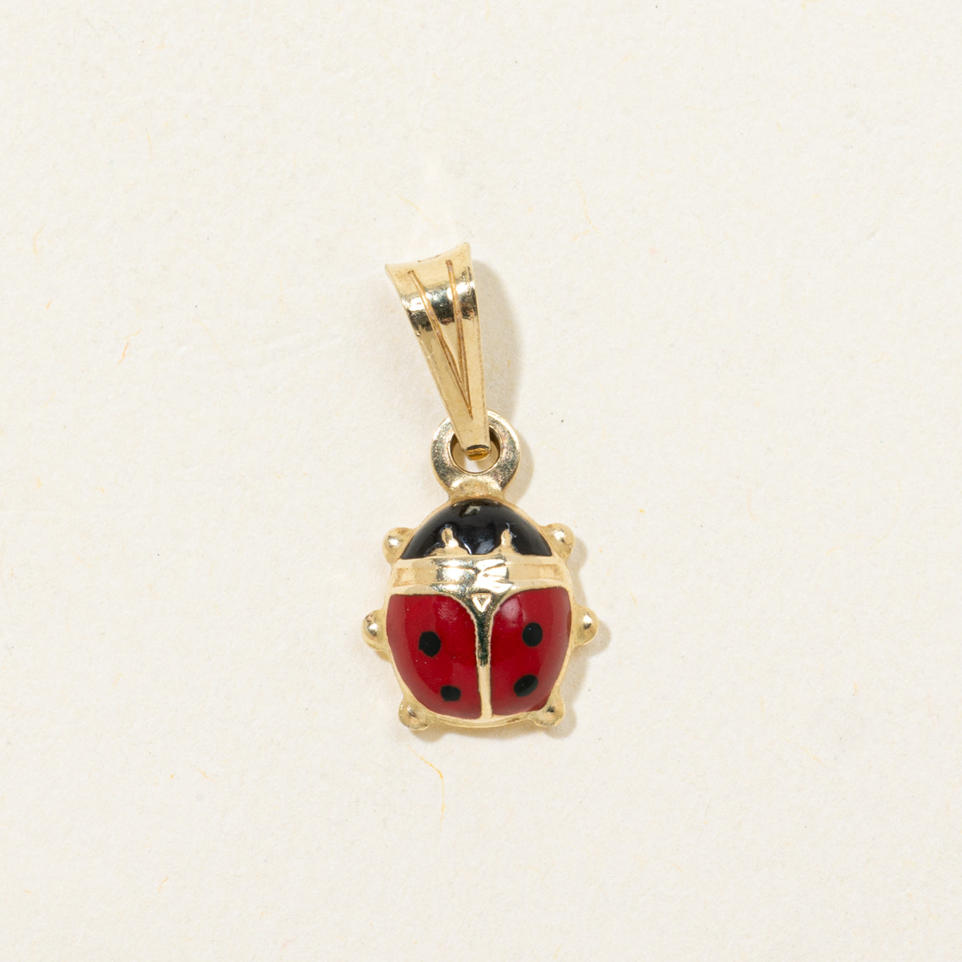 Pendentif coccinelle en or 14 carats