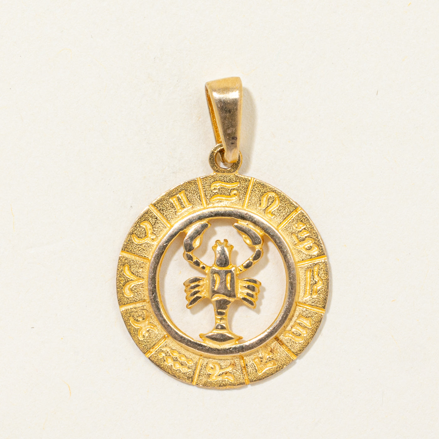 20k Zodiac Calendar Pendant