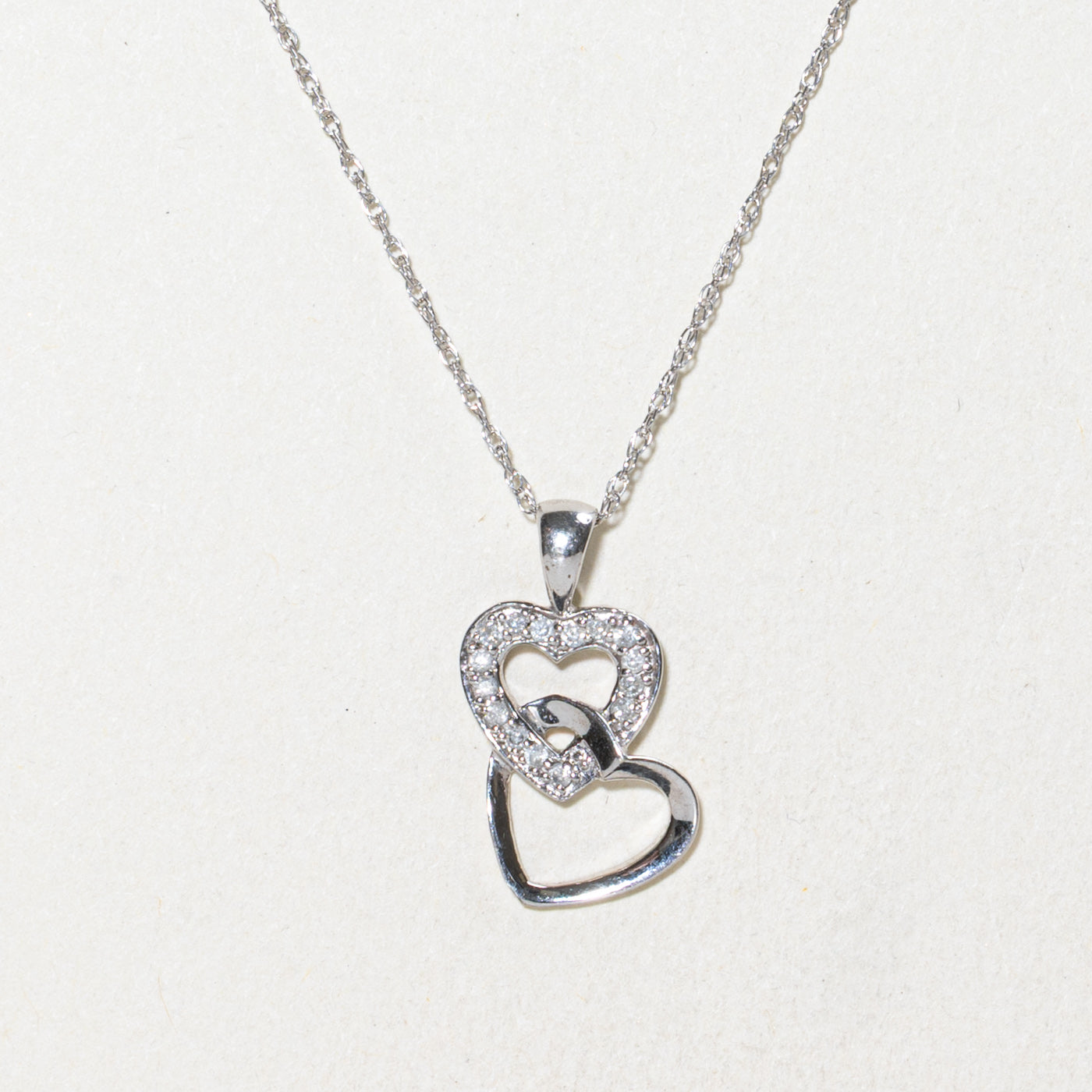 10k Diamond Hearts Pendant Necklace | 0.08ctw | 16"