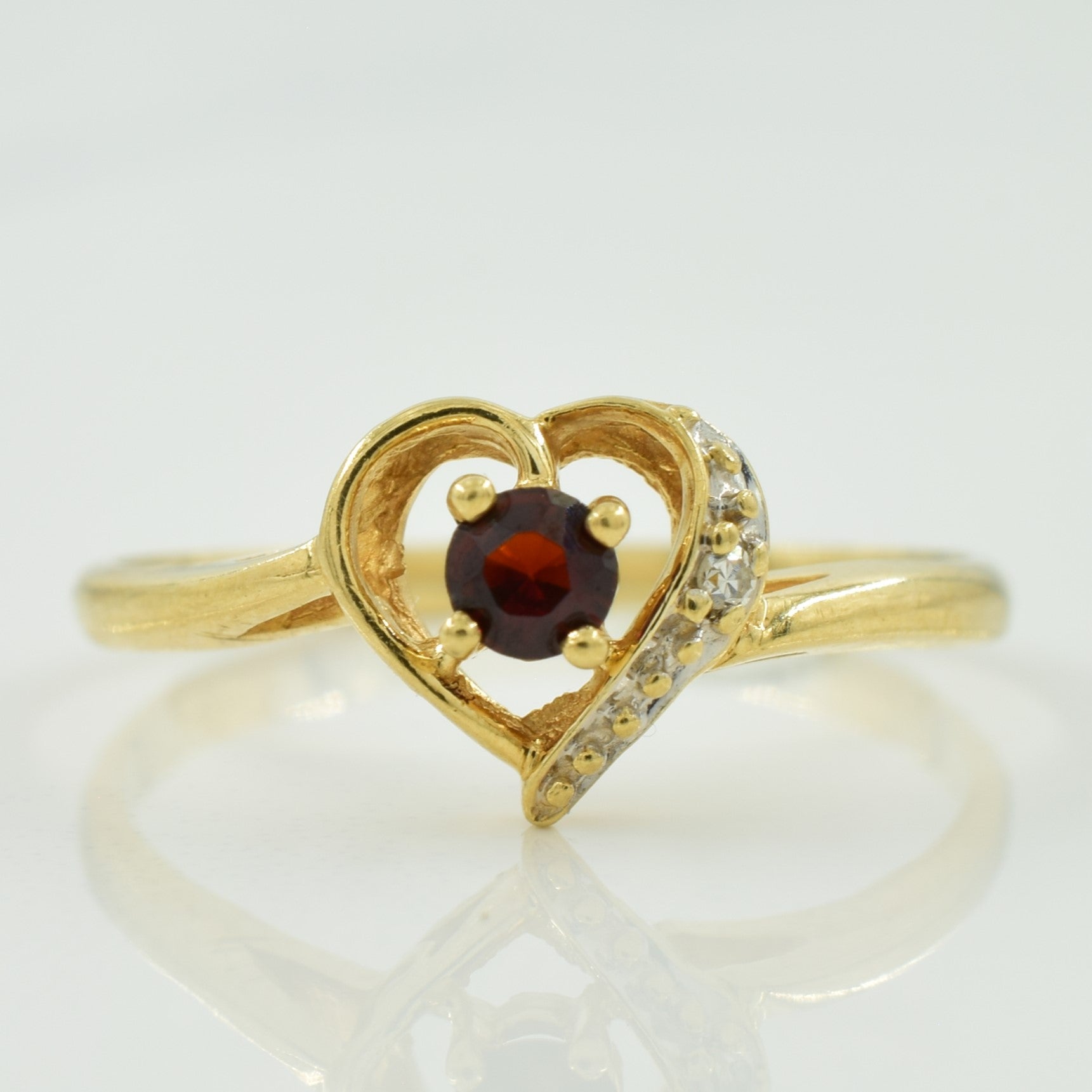 Garnet & Diamond Heart Shaped Ring | 0.12ct, 0.01ct | SZ 6.25 |