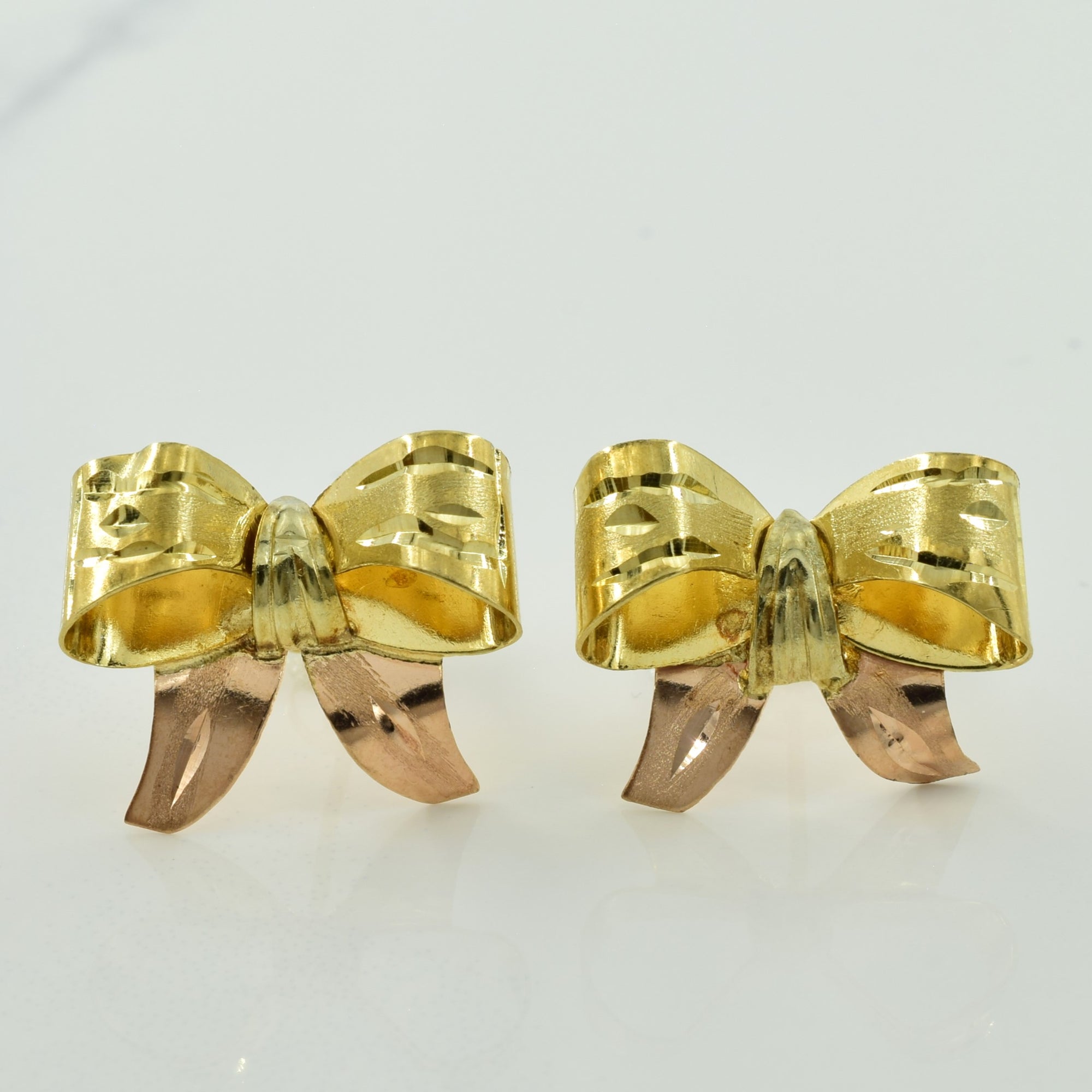 14k Yellow & Rose Gold Bow Tie Stud Earrings |