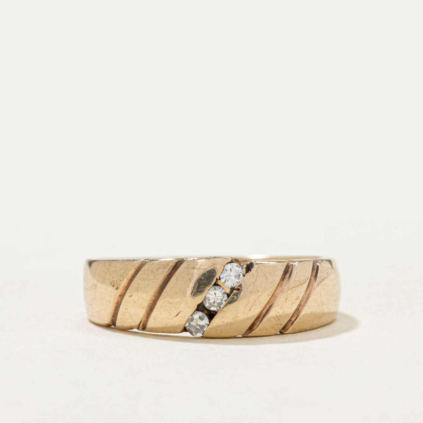 14K Three Stone Diagonal Diamond Grooved Ring | 0.05ctw | SZ 5.25