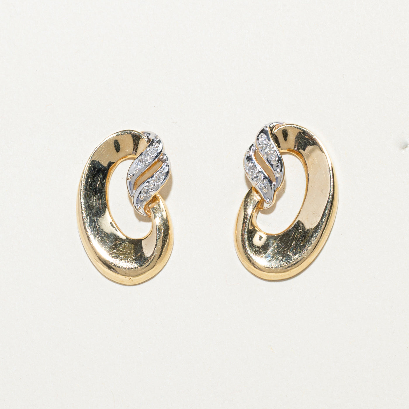 14K Diamond Swirly Oval Stud Earrings | 0.12ct