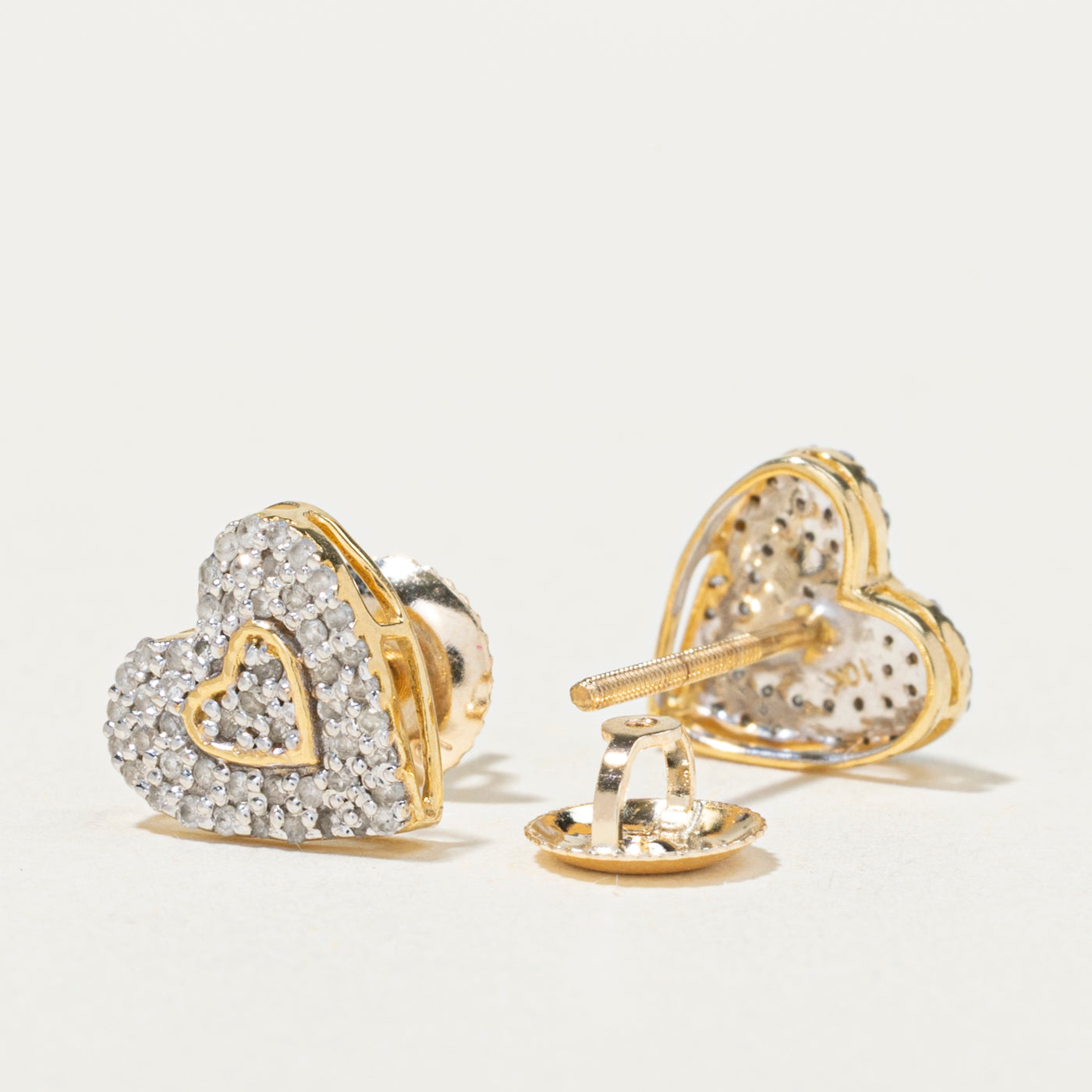 10K Diamond Heart Cluster Stud Earrings | 0.20ctw