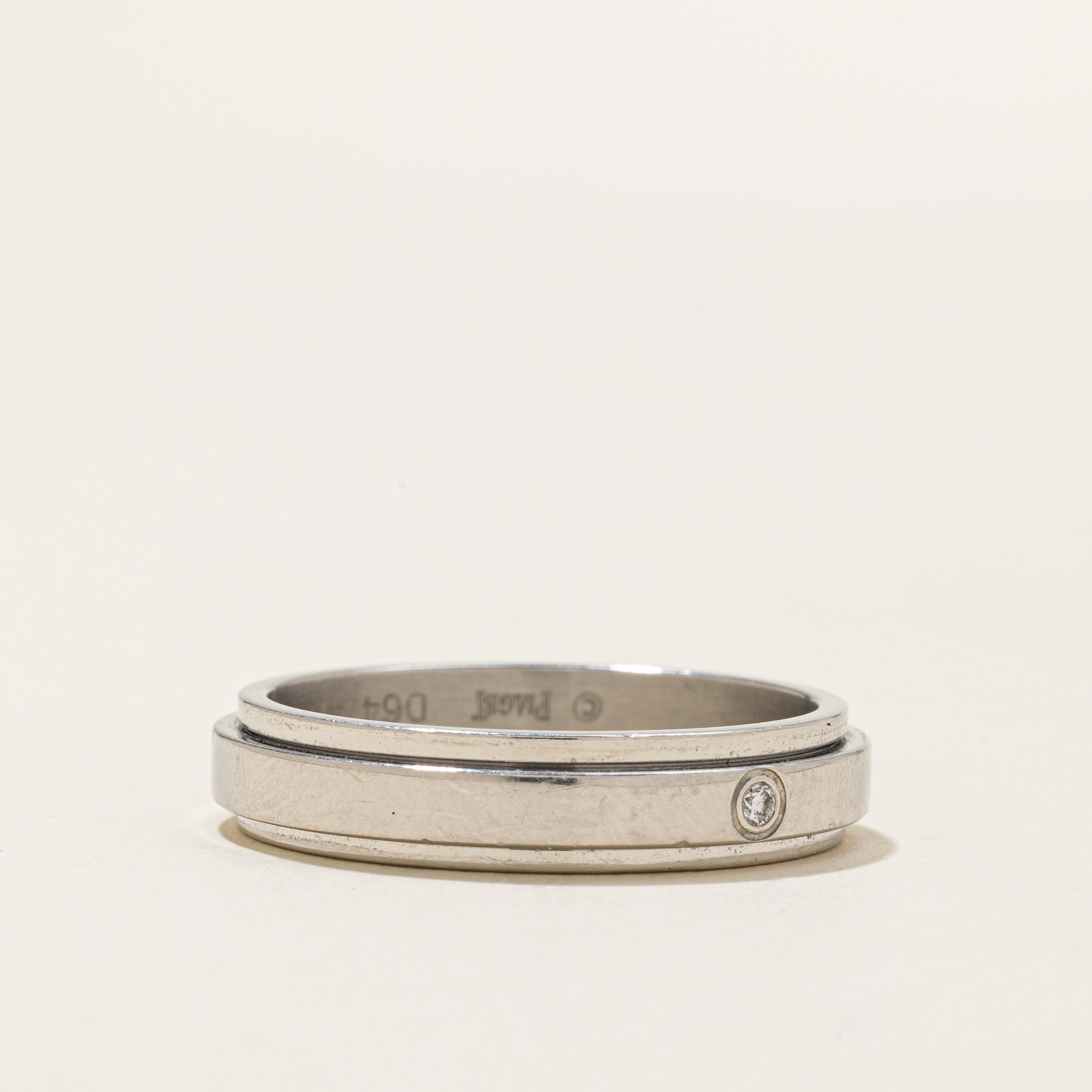 'Piaget' Platinum Possession Ring | 0.01ctw | SZ 9.5 |