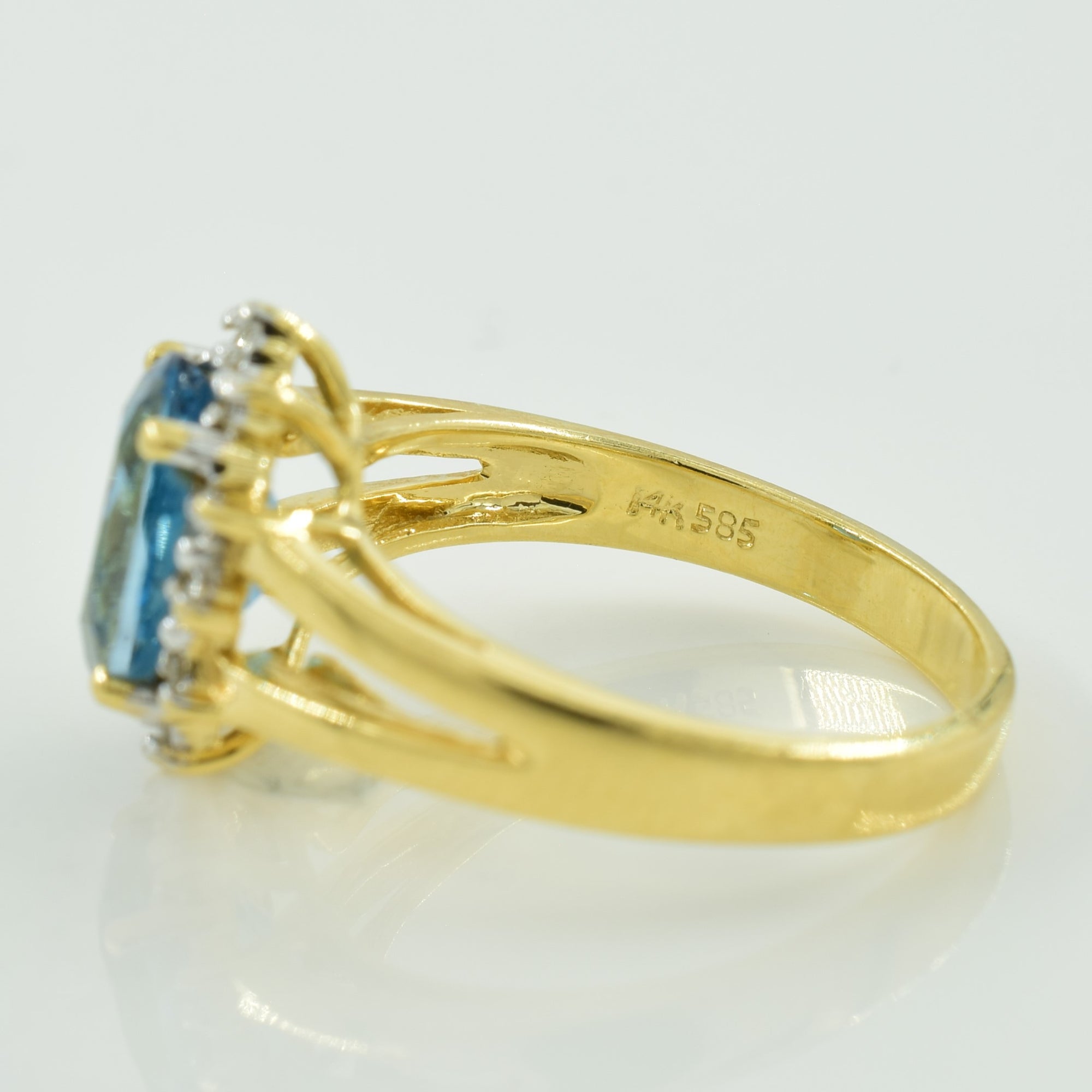 Blue Topaz & Diamond Halo Ring | 1.75ct, 0.08ctw | SZ 6.25 |