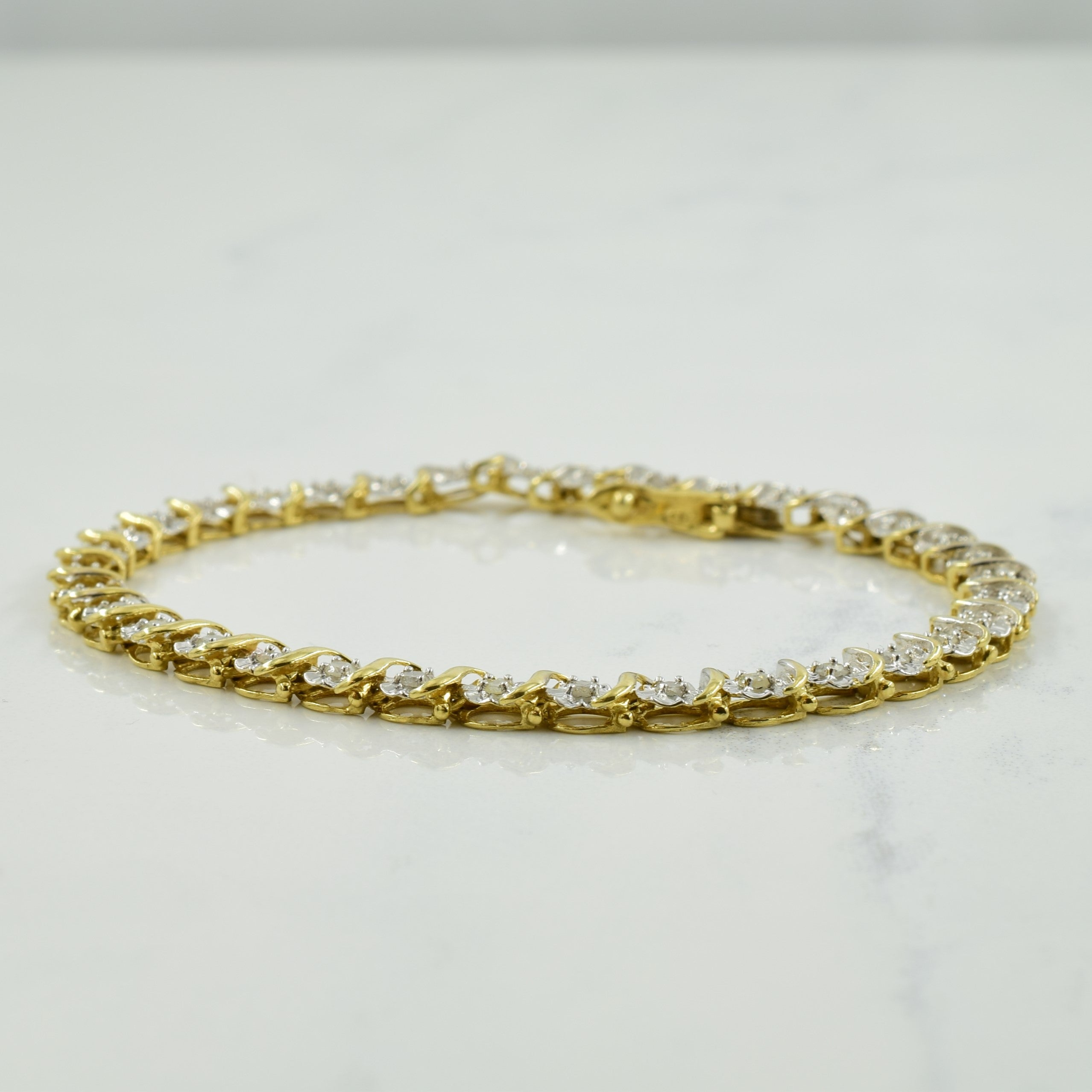 Bracelet de tennis en or bicolore 10 carats avec diamants | 0,88 ct | 17,8 cm | 