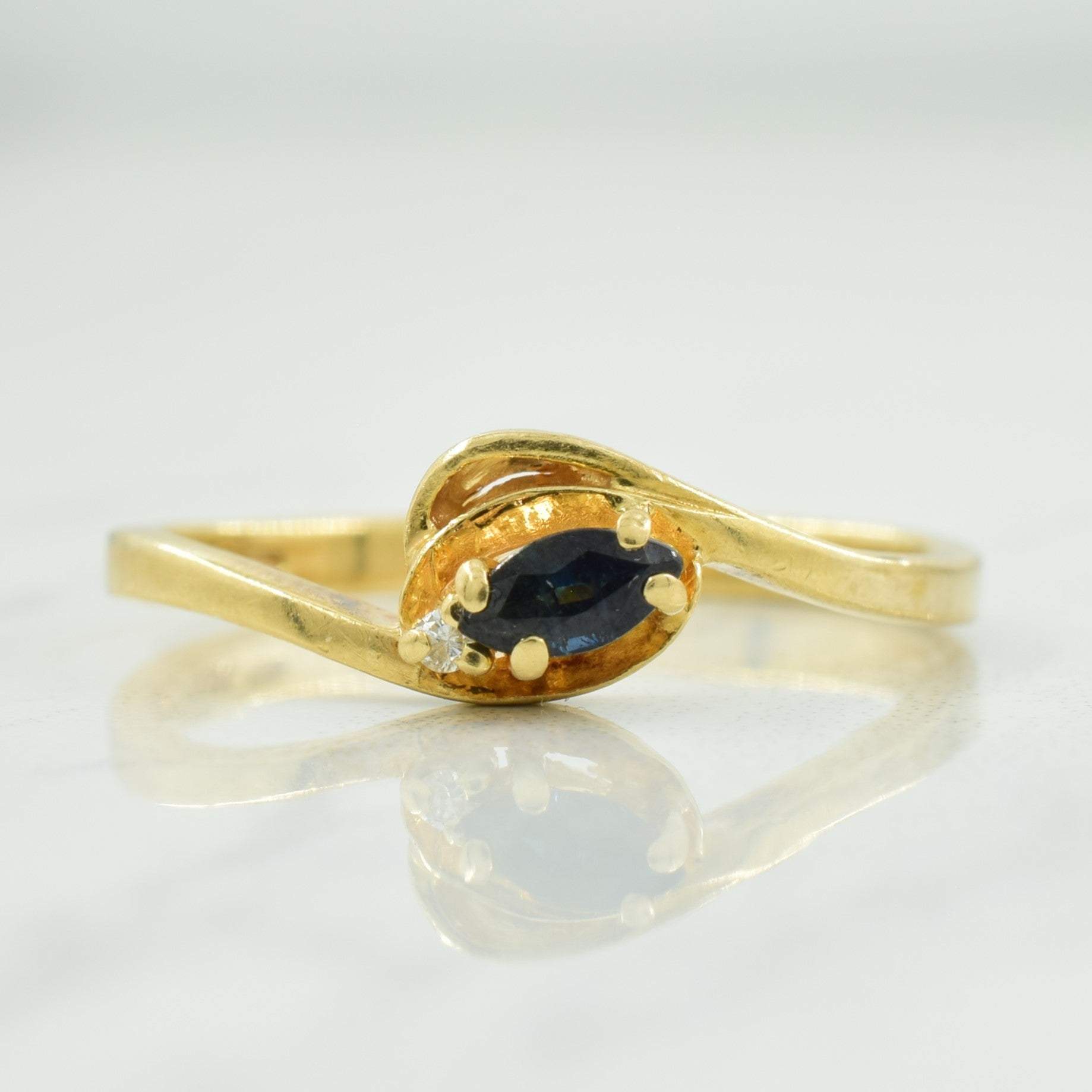 Sapphire & Diamond Bypass Ring | 0.12ct, 0.01ct | SZ 7.5 |