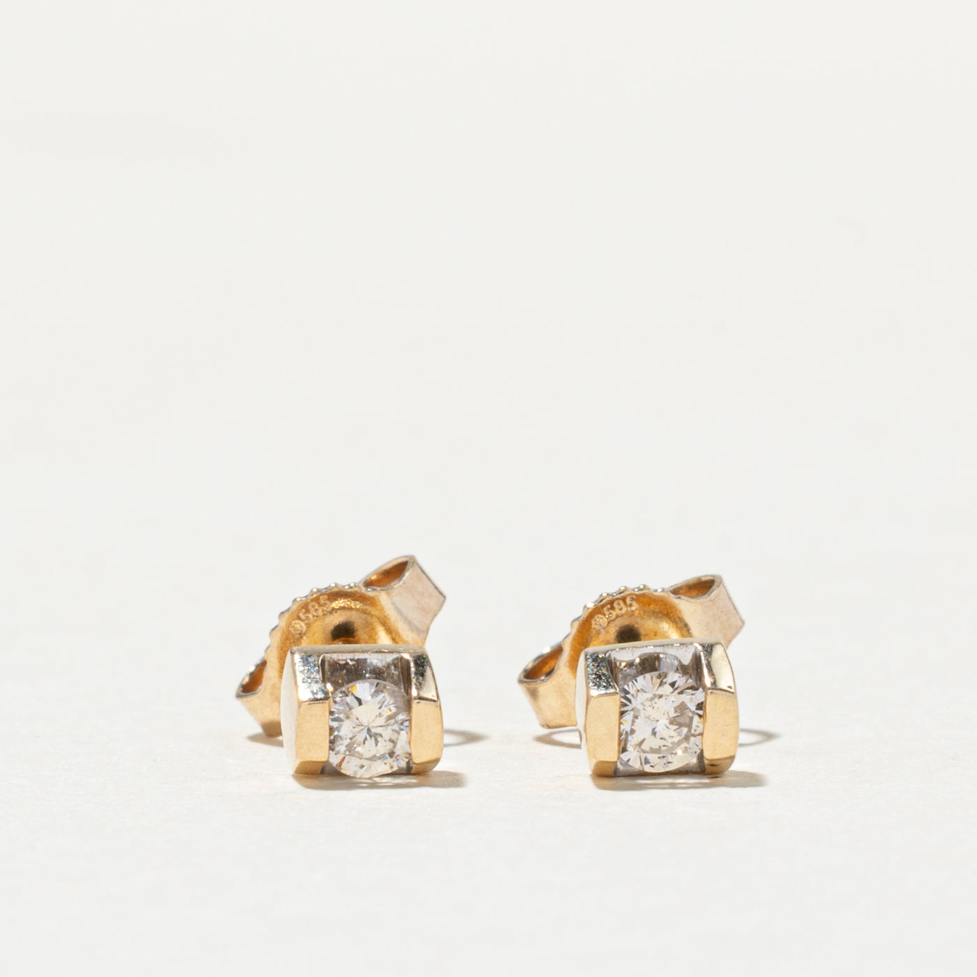 14K Tension Set Diamond Stud Earrings | 0.14ctw