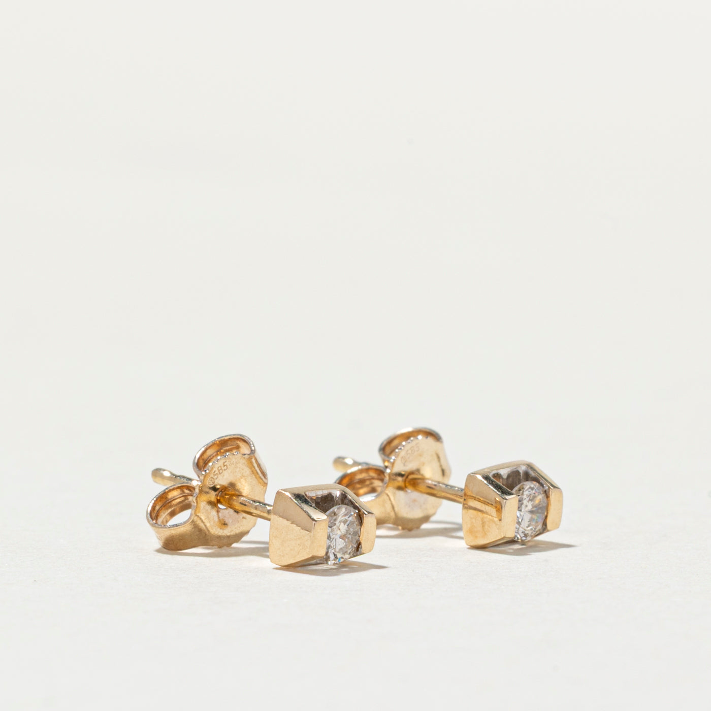 14K Tension Set Diamond Stud Earrings | 0.14ctw