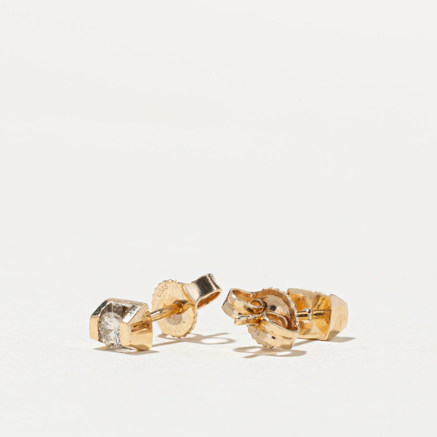 14K Tension Set Diamond Stud Earrings | 0.14ctw